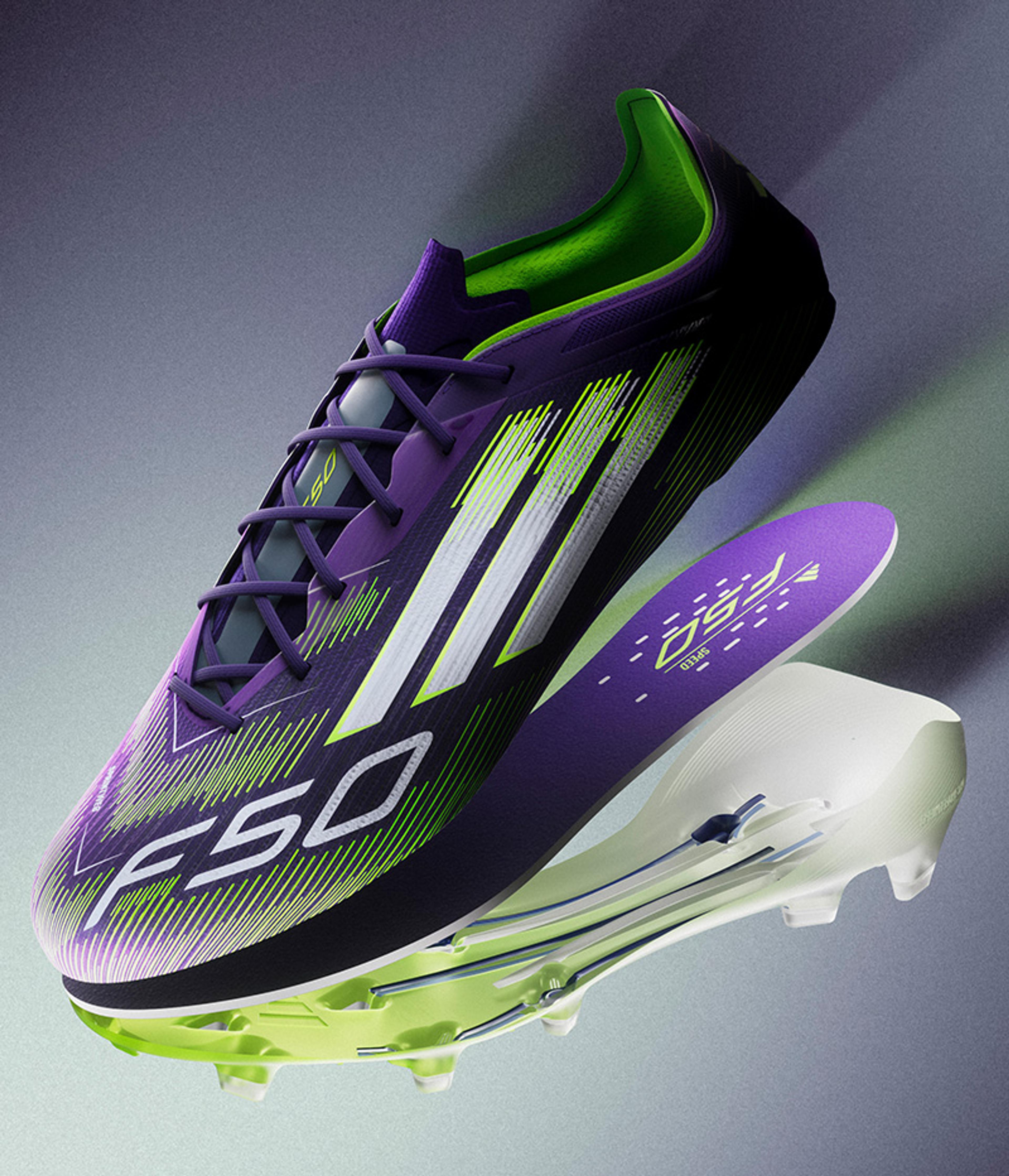 a pair of purple and green adidas f50 soccer cleats