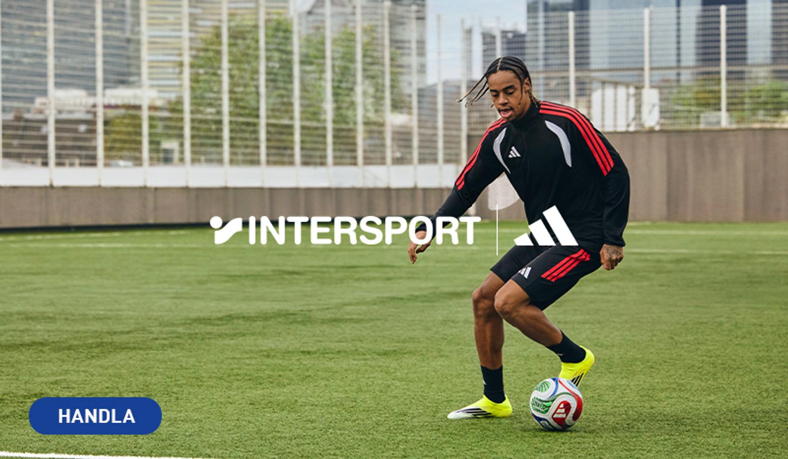 Male soccer player in Adidas gear dribbling a ball on a turf field. Intersport and Adidas logos, with a 'HANDLA' button.