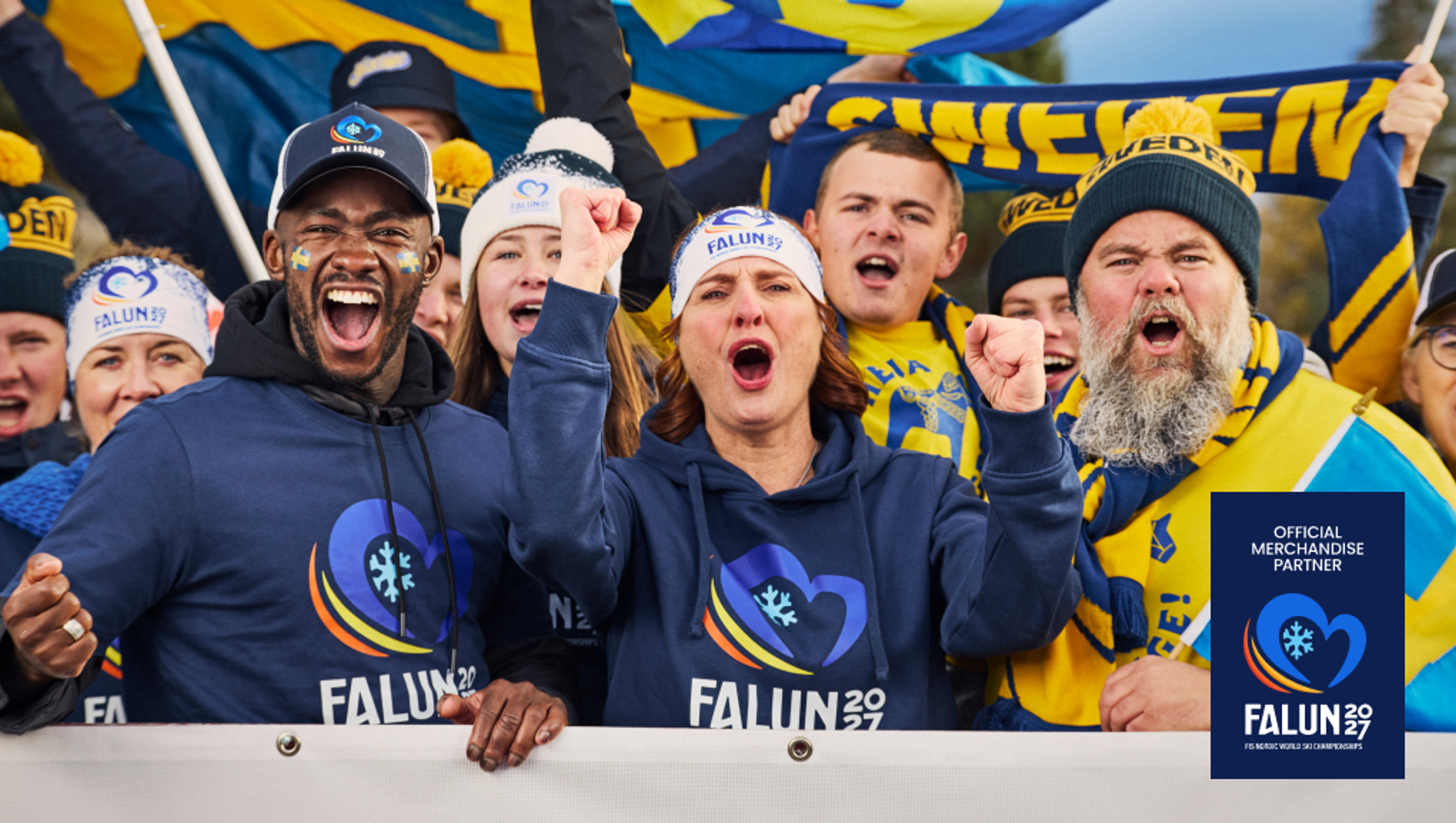 Cheering fans in Falun 2027 merchandise and Swedish colors.