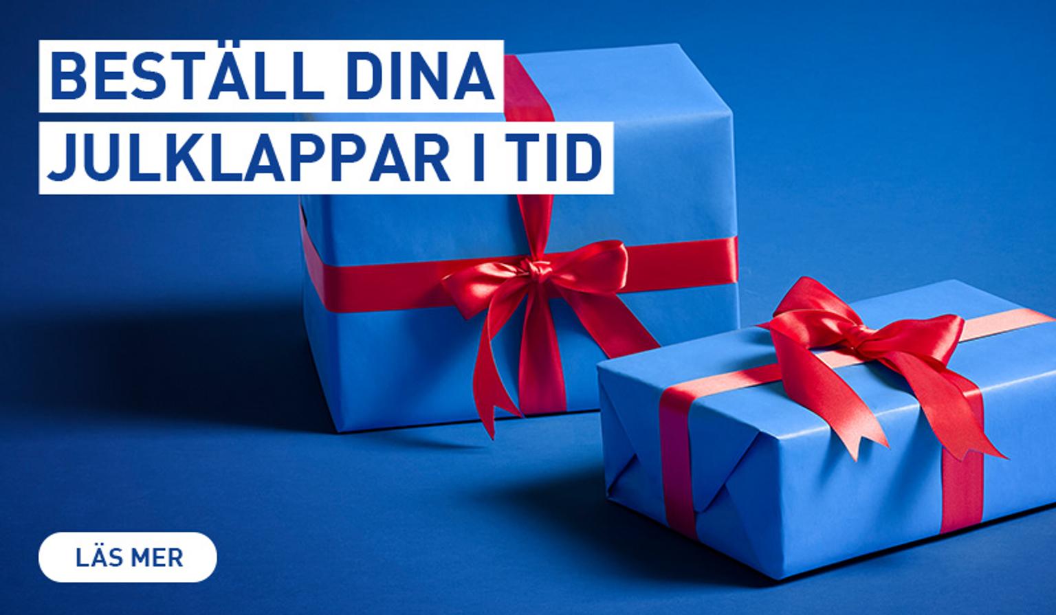 Two blue gift boxes with red ribbons on a blue background. Text reads "BESTÄLL DINA JULKLAPPAR I TID" (Order your Christmas gifts in time) and "LÄS MER" (Read more).