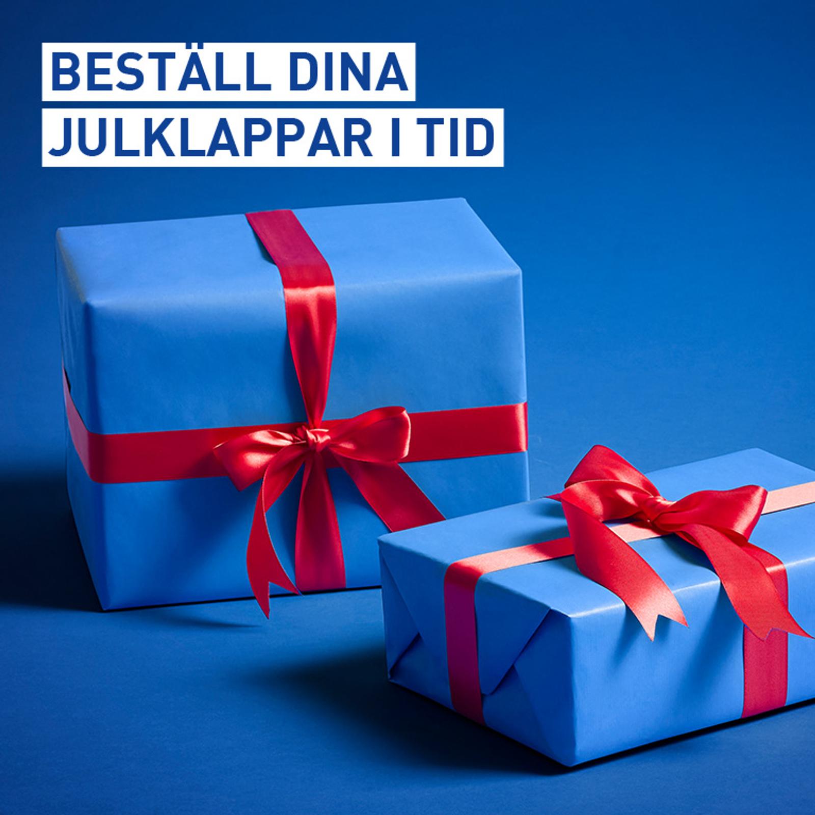 Two blue gift boxes with red ribbons on a blue background. Text: "BESTÄLL DINA JULKLAPPAR I TID" (Order your Christmas gifts in time).
