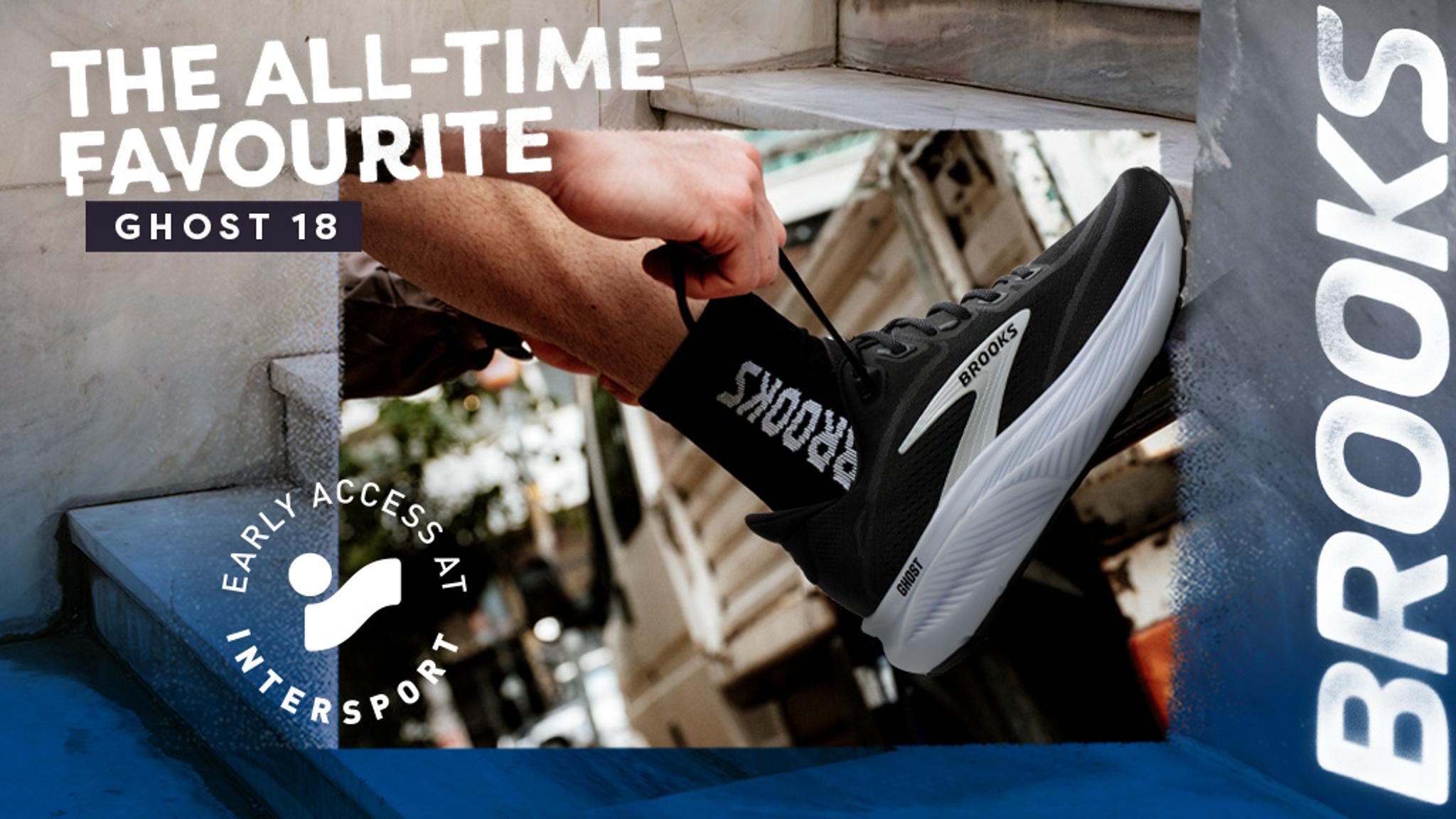 Brooks Ghost 18 running shoe ad. A hand ties a black shoe, described as 'The All-Time Favourite' with 'Early Access at Intersport'.