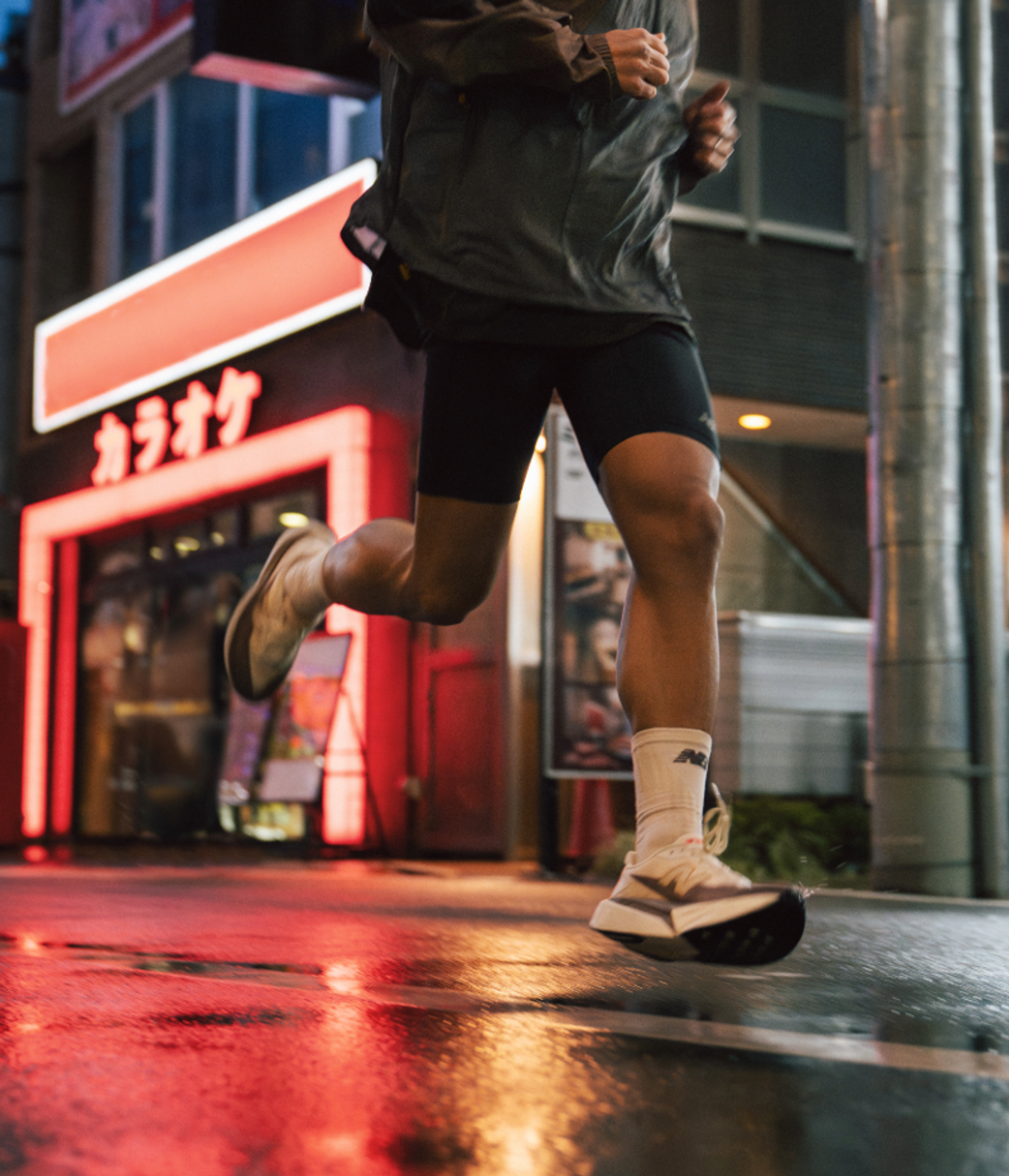 a person running in front of a building with chinese writing on it