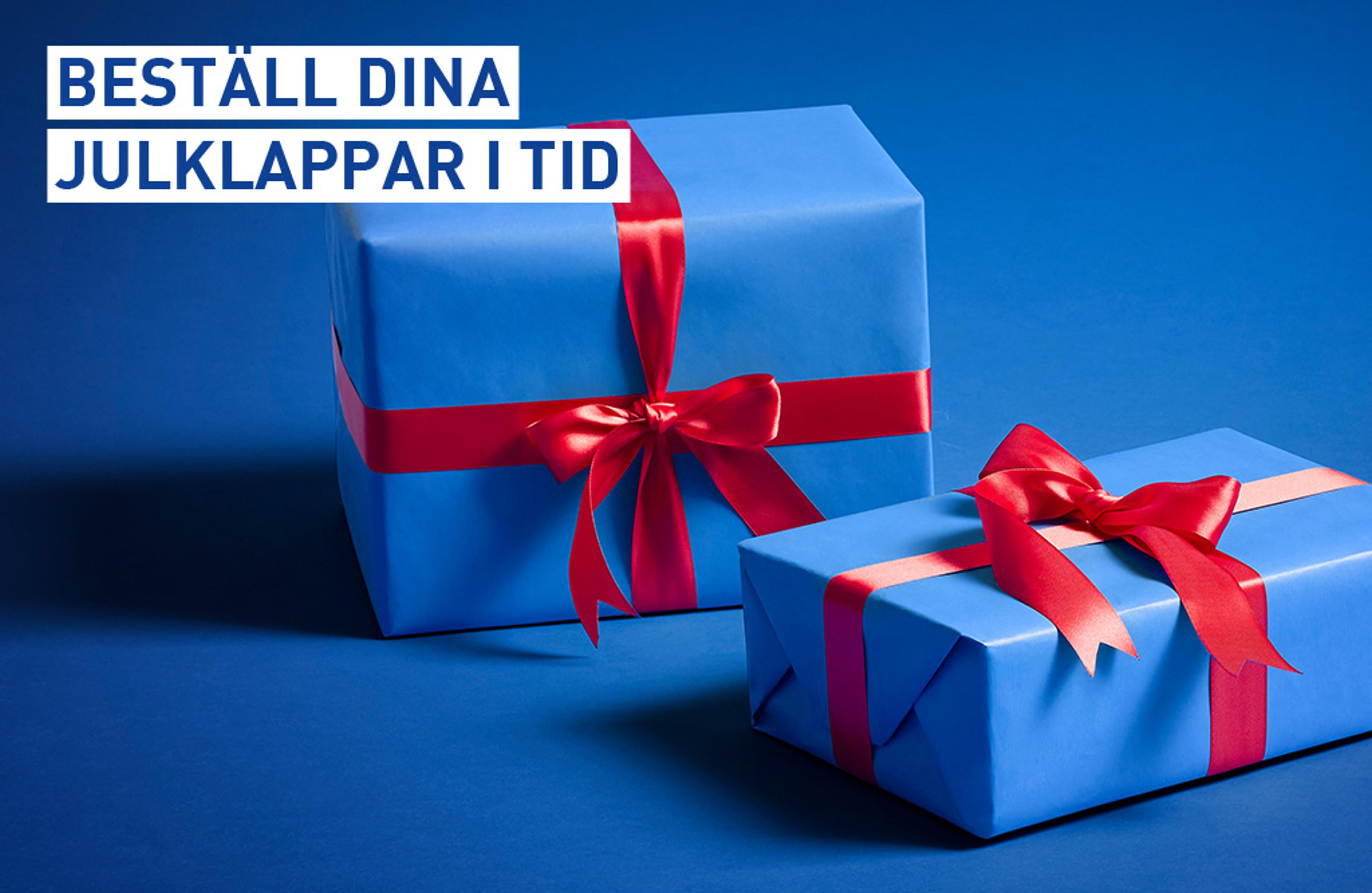Two blue gift-wrapped presents with red ribbons on a blue background. Text: Order your Christmas presents in time.