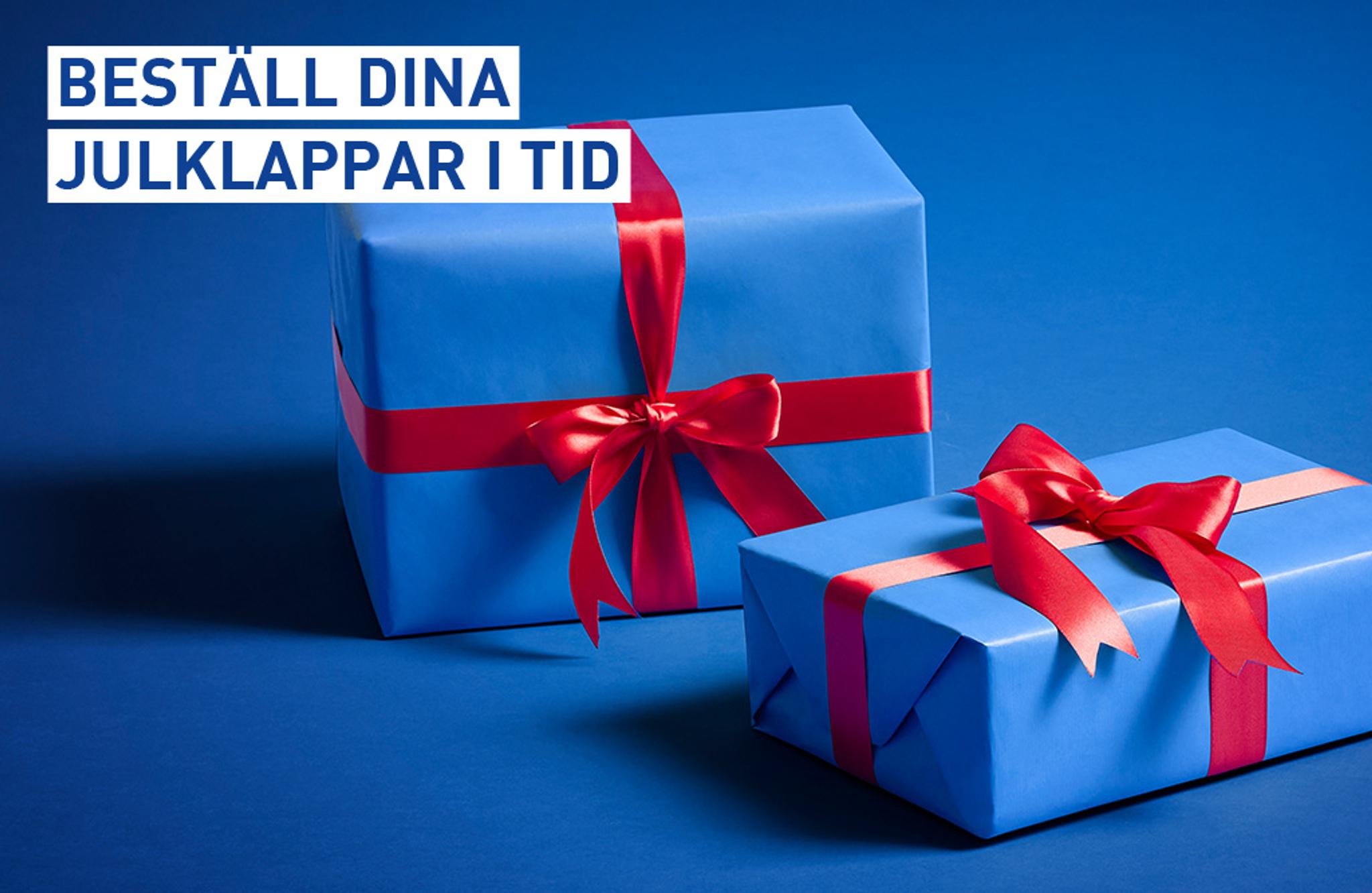 Two blue gift-wrapped presents with red ribbons on a blue background. Text: Order your Christmas presents in time.