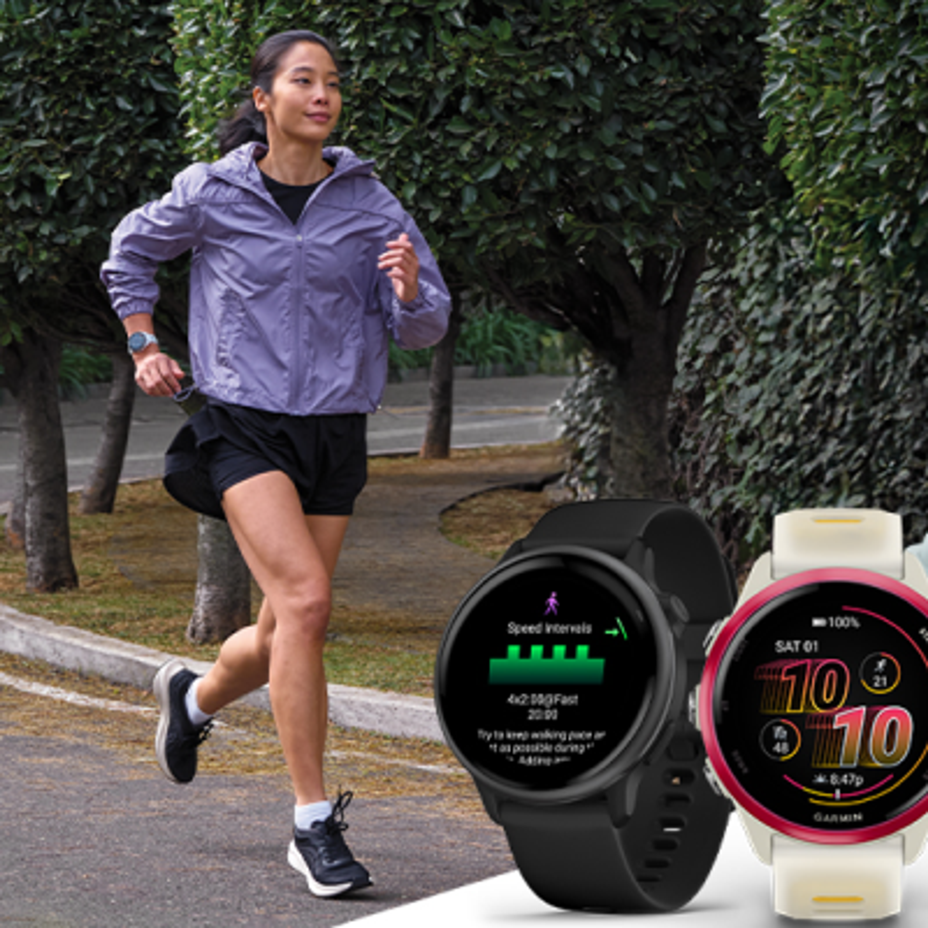 A woman runs outdoors, with two smartwatches displaying fitness information in the foreground.