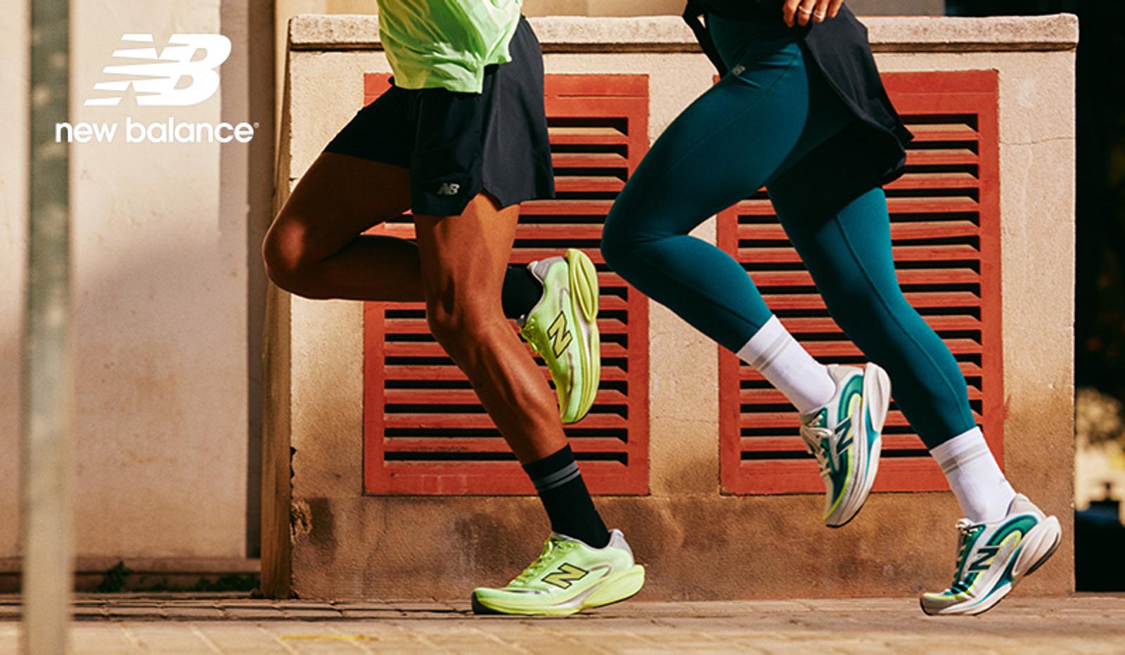 Lower bodies of two runners wearing New Balance shoes, with the New Balance logo in the corner.