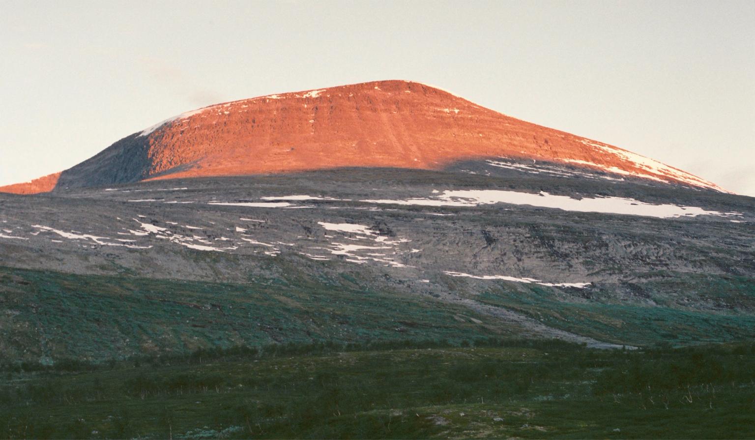 a mountain with a lot of snow on it