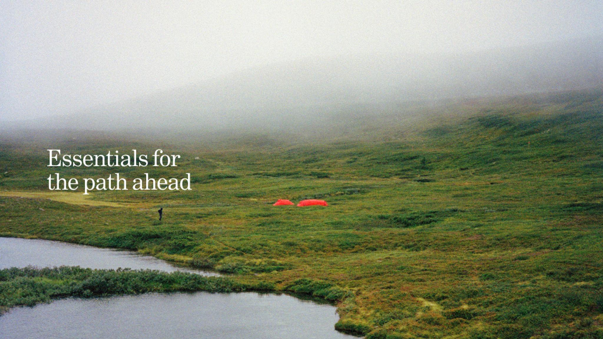 Misty, green landscape with a lake, a person, two red tents, and the text "Essentials for the path ahead."