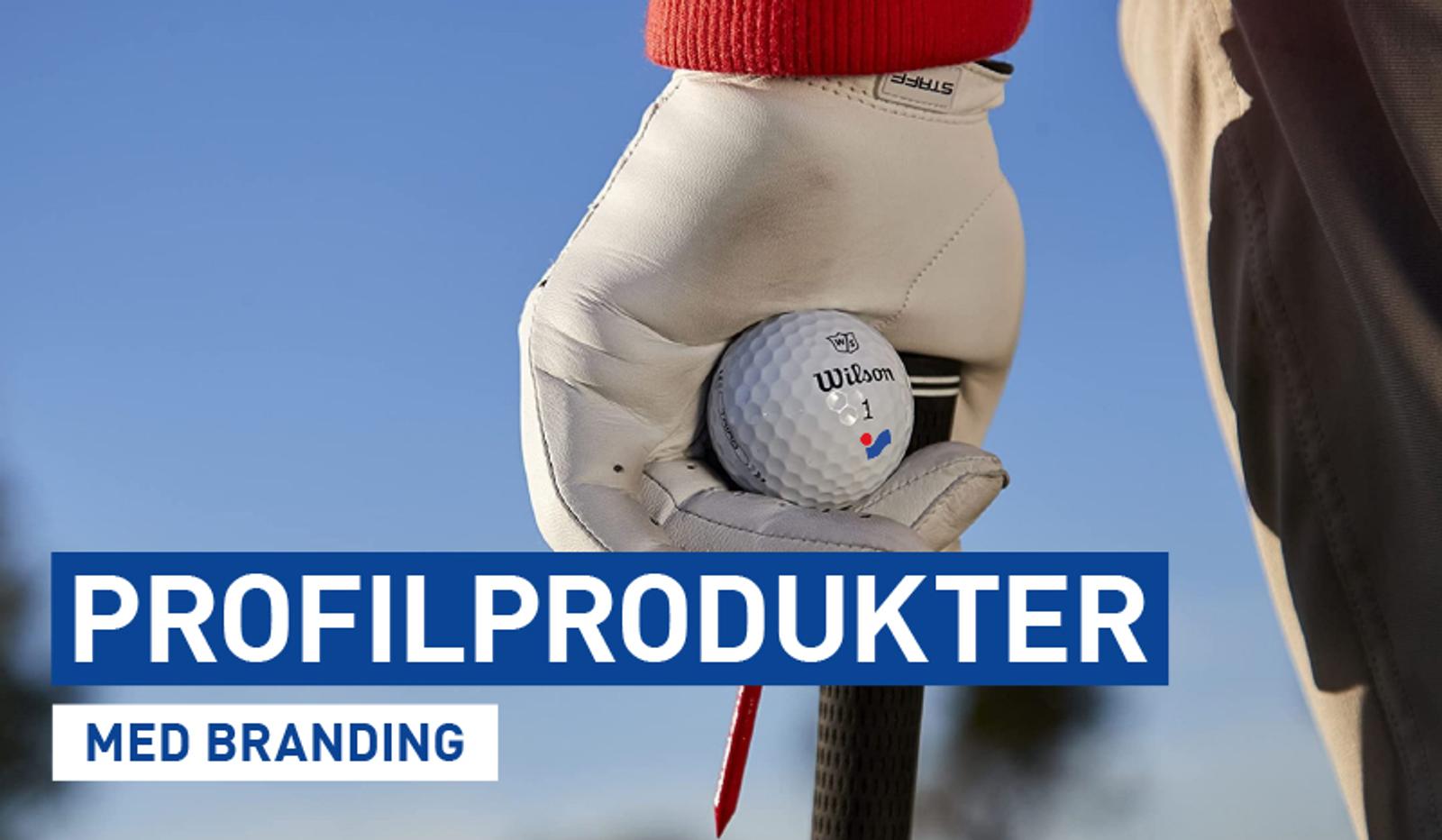 a person is holding a golf ball in their hand .