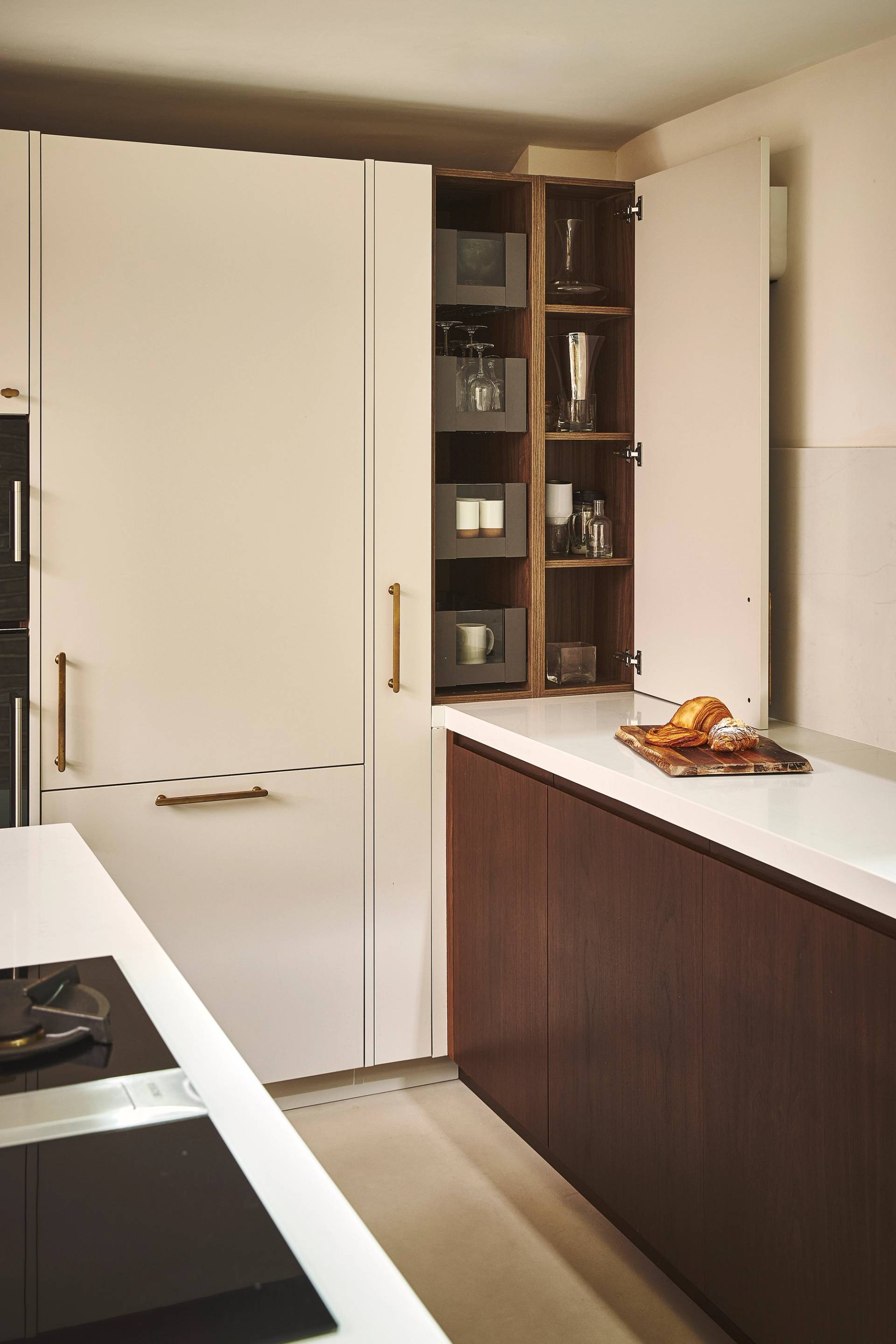 Modern kitchen with open white counter top standing cabinet