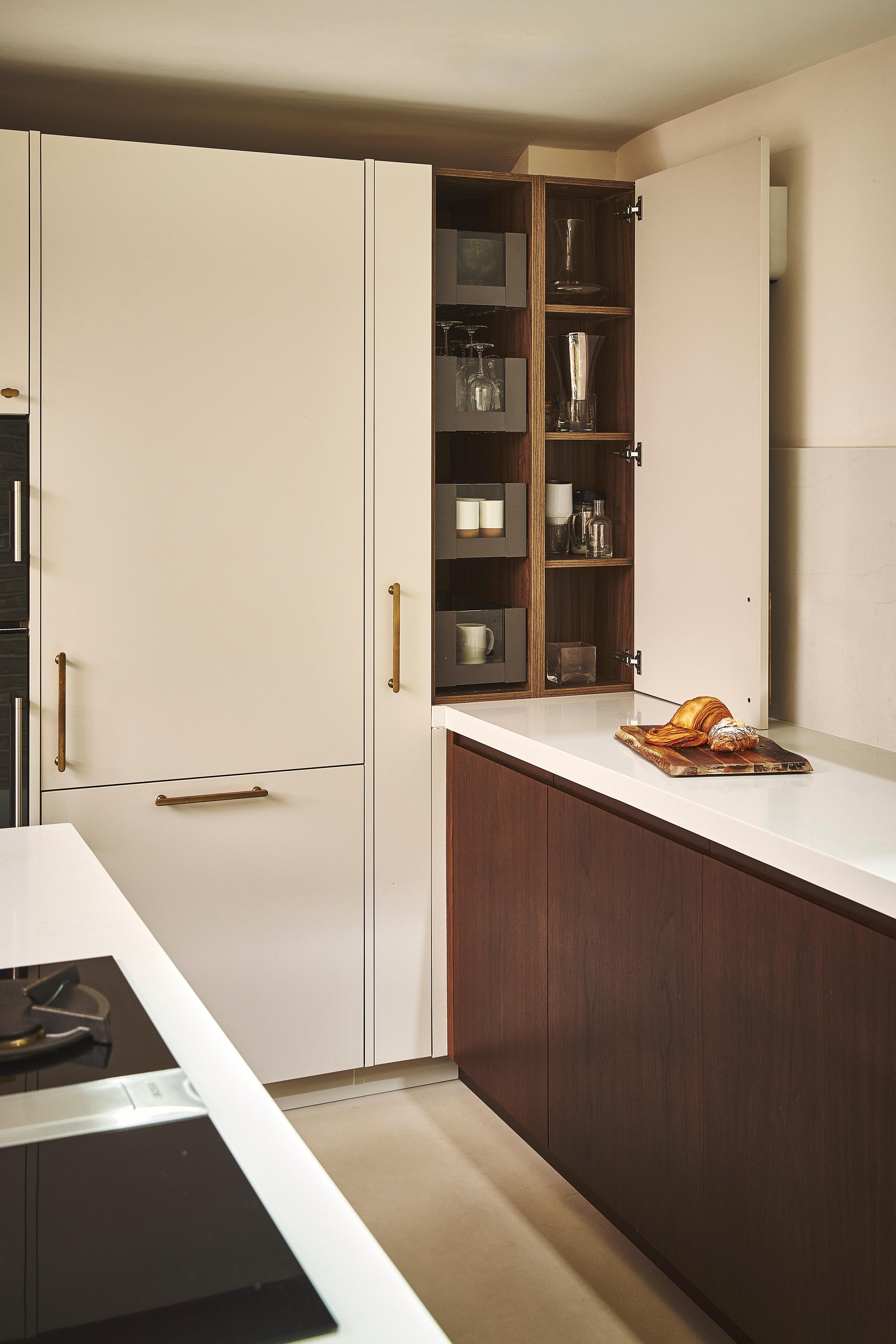 Modern kitchen with open white counter top standing cabinet