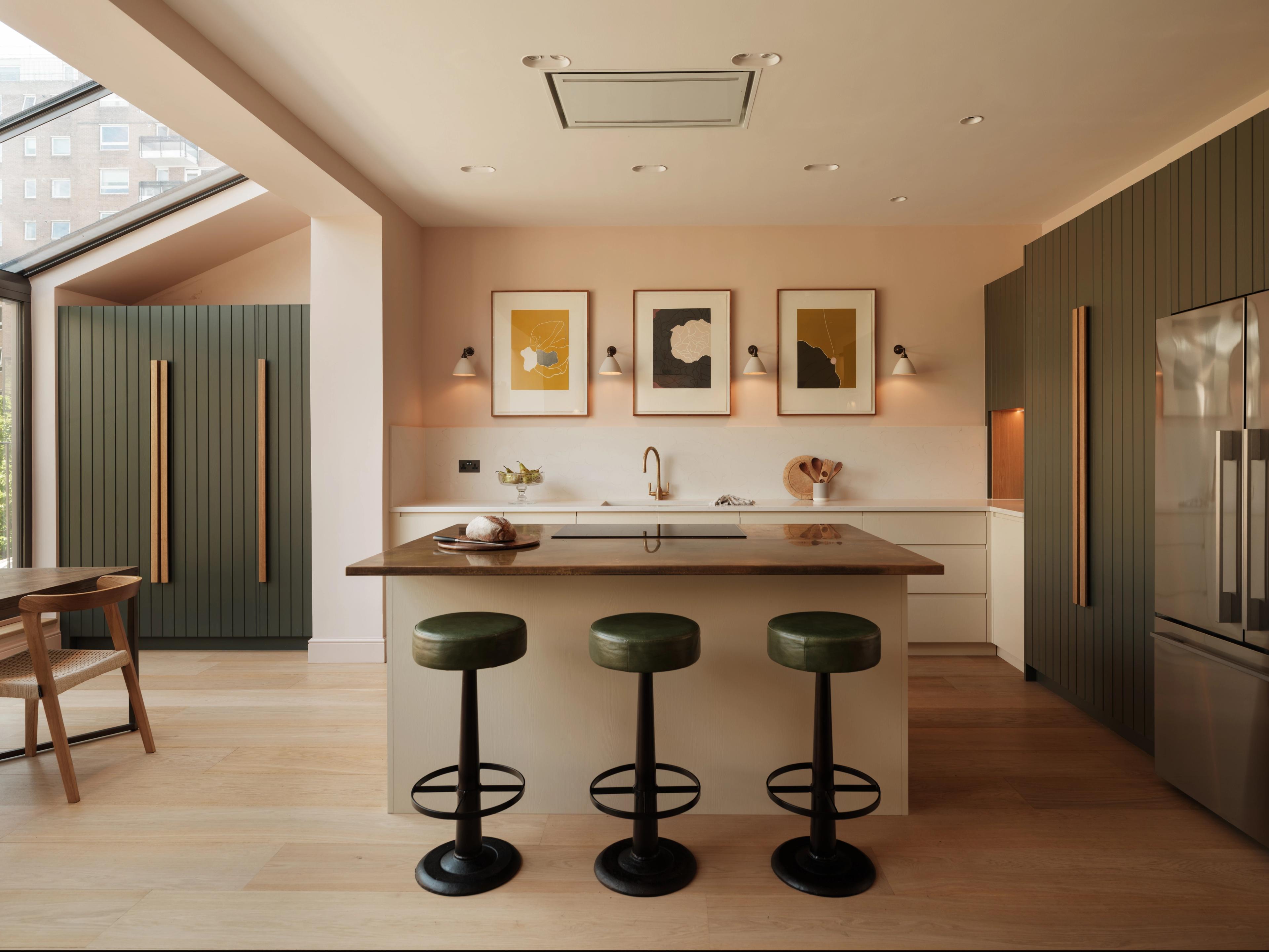 Sands End kitchen island with bar seating, Radome cabinetry and a glazed roof letting in natural light