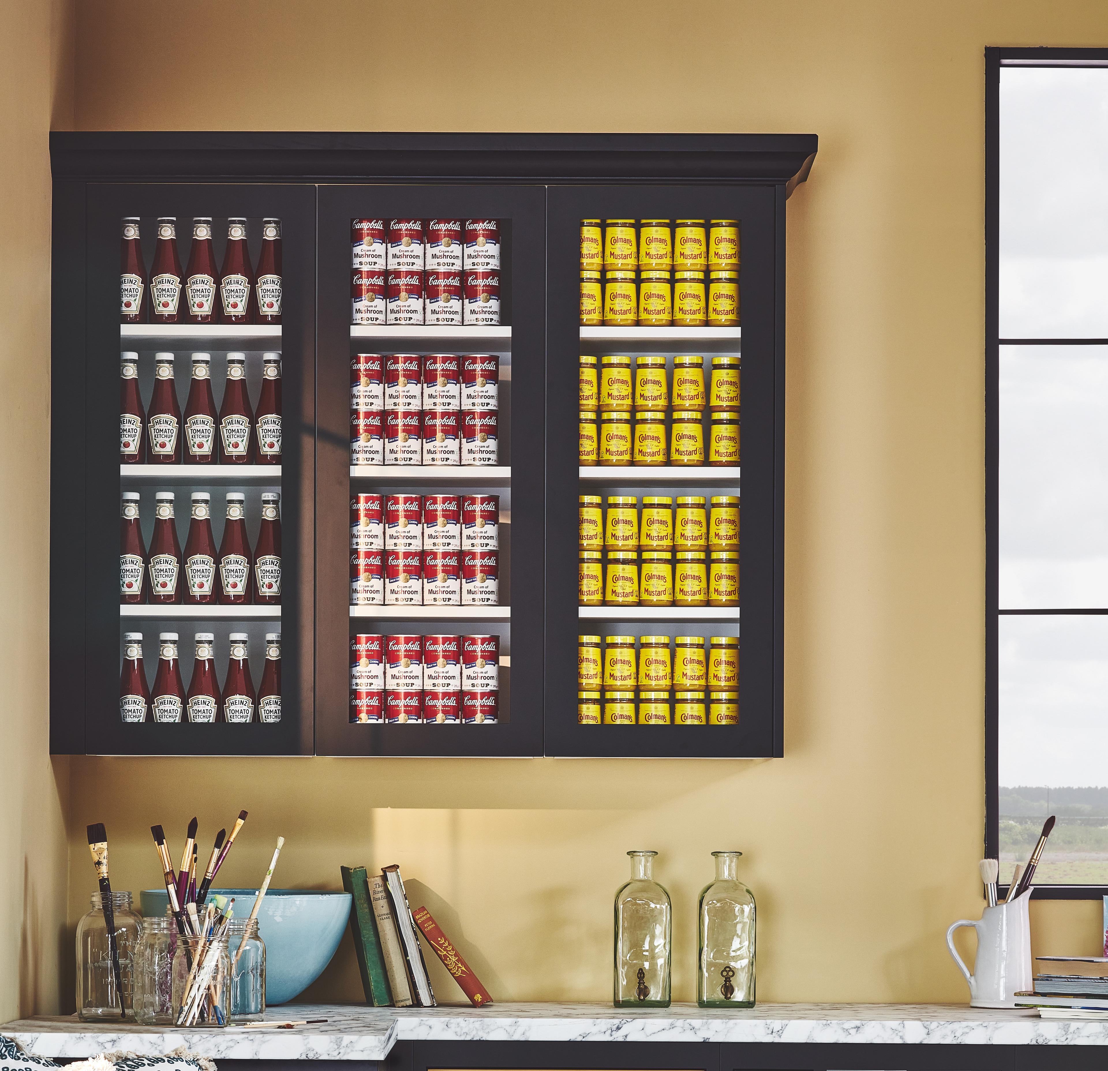 Wall Cabinet filled with Colmans Mustard, Campbells soup and Heinz Ketchup
