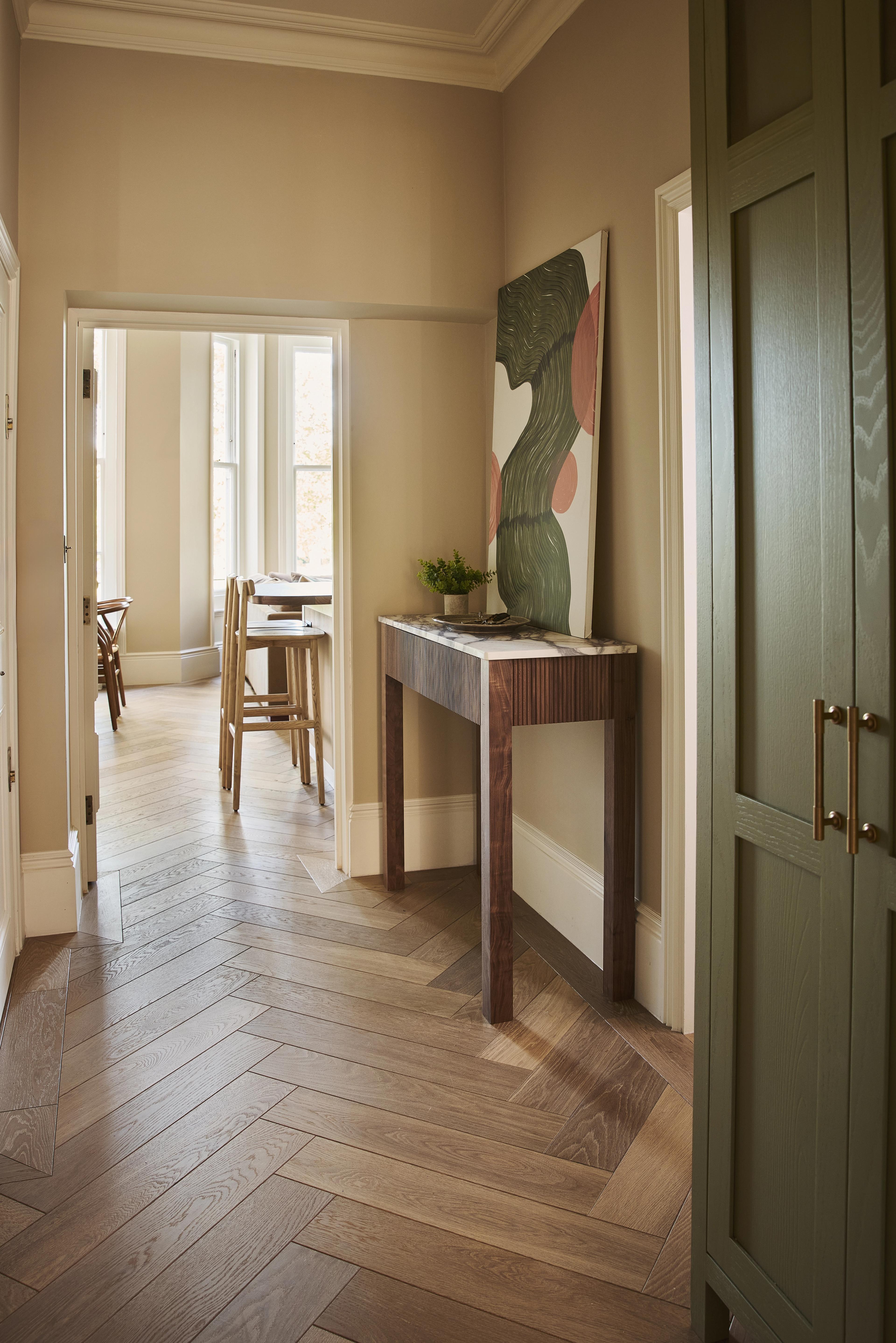 Old Chelsea kitchen by Naked Kitchens, showing the herringbone oak floor by Waxed Floors