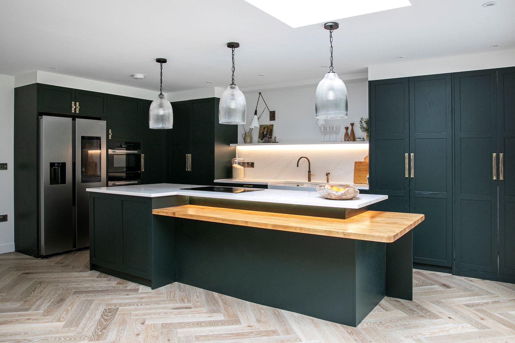 dark green shaker kitchen with split-level 