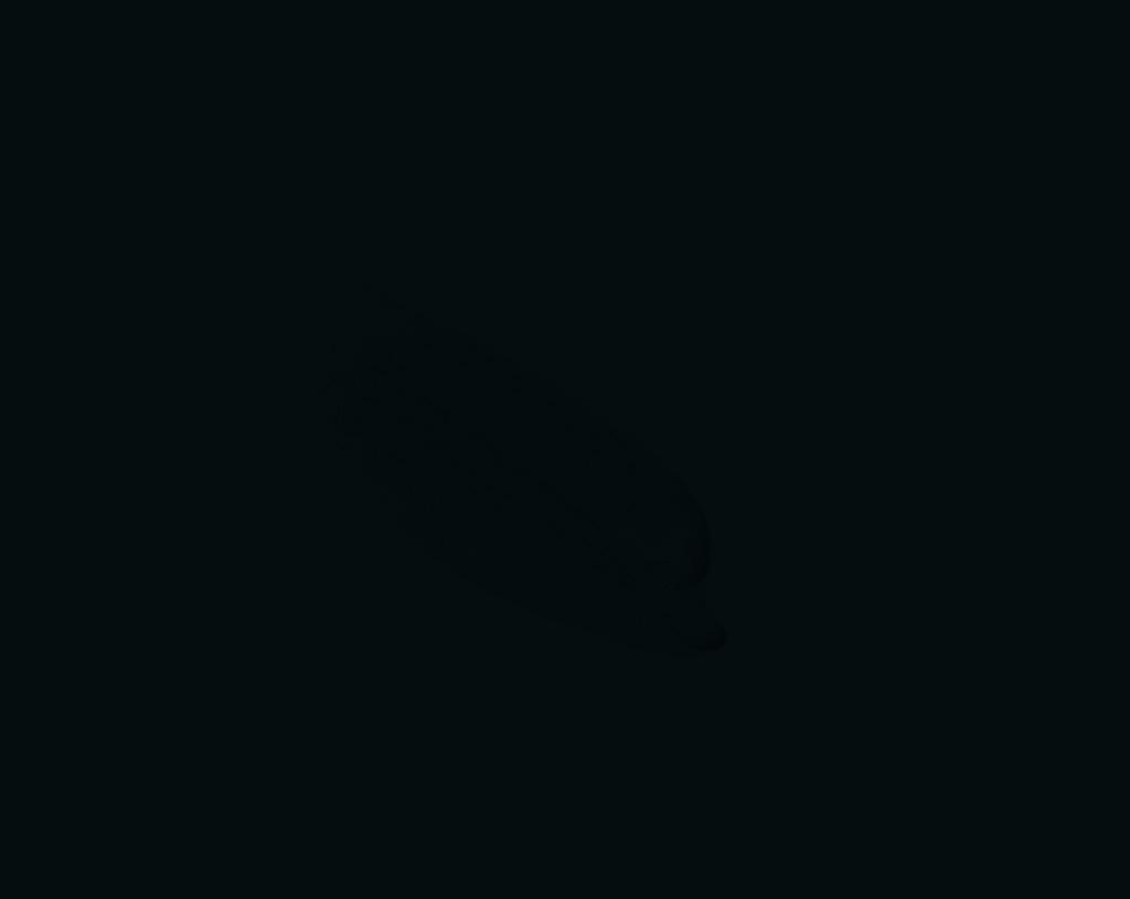 A single brushstroke of Oyster Catcher paint on a slightly lighter Black background. The paint appears smooth and slightly textured, with soft edges.