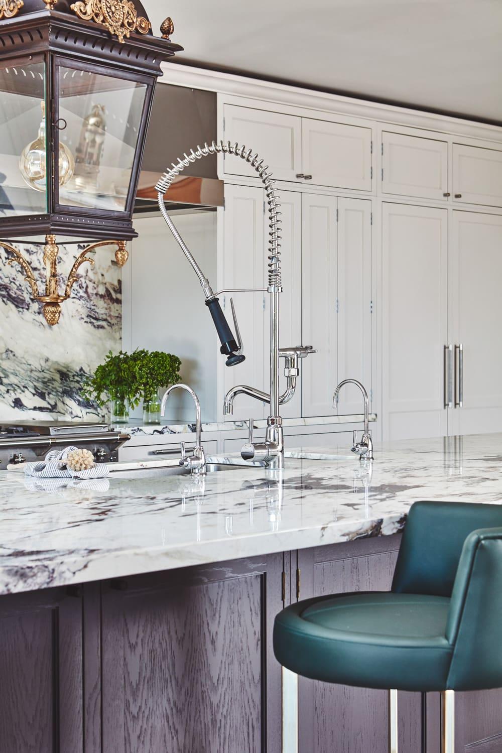 Stylish Chester Row kitchen with a pot filler tap, providing easy access to hot water for filling pots and pans. The pot filler tap adds a touch of convenience and style to the kitchen.