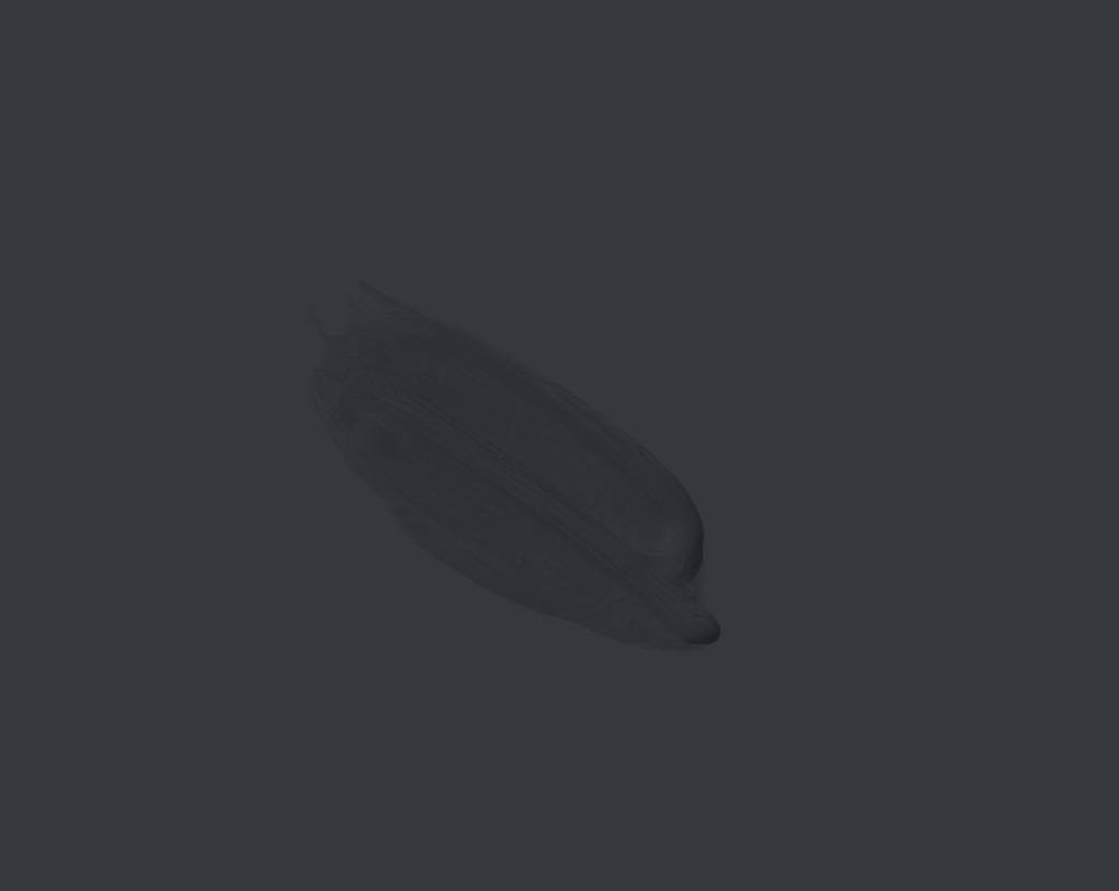 A single dark gray brushstroke of paint is centered on a solid, slightly lighter gray background. The brushstroke appears textured and elongated, with soft, indistinct edges.