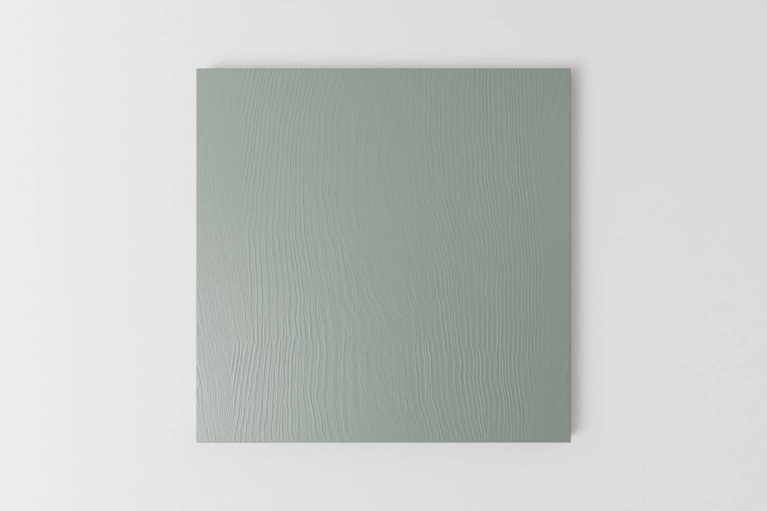 Picture of a square sample painted with a visible grain in Naked Kitchen's Marsh Green green colour