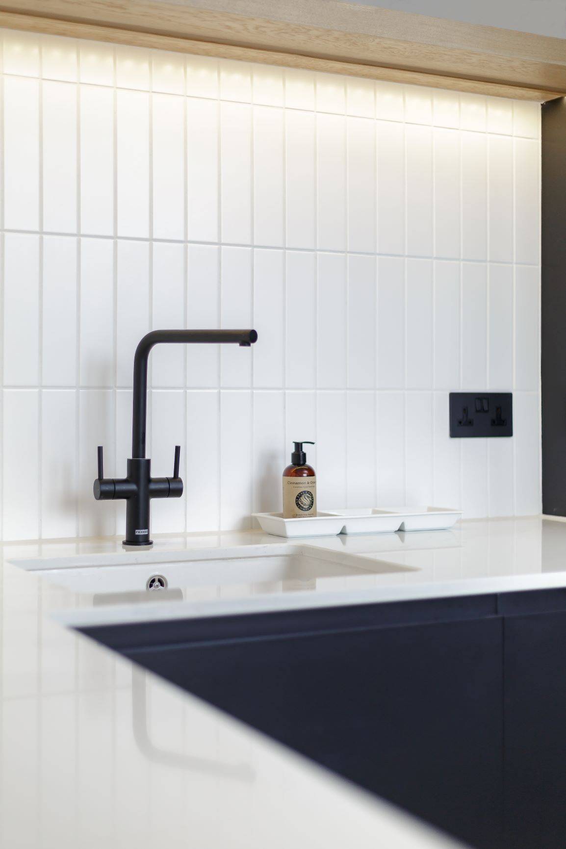 Close-up of the kitchen's open shelving, showcasing the storage capacity and decorative charm. Glassware and decorative accents add a touch of personality, while the ample space ensures organisation and accessibility.