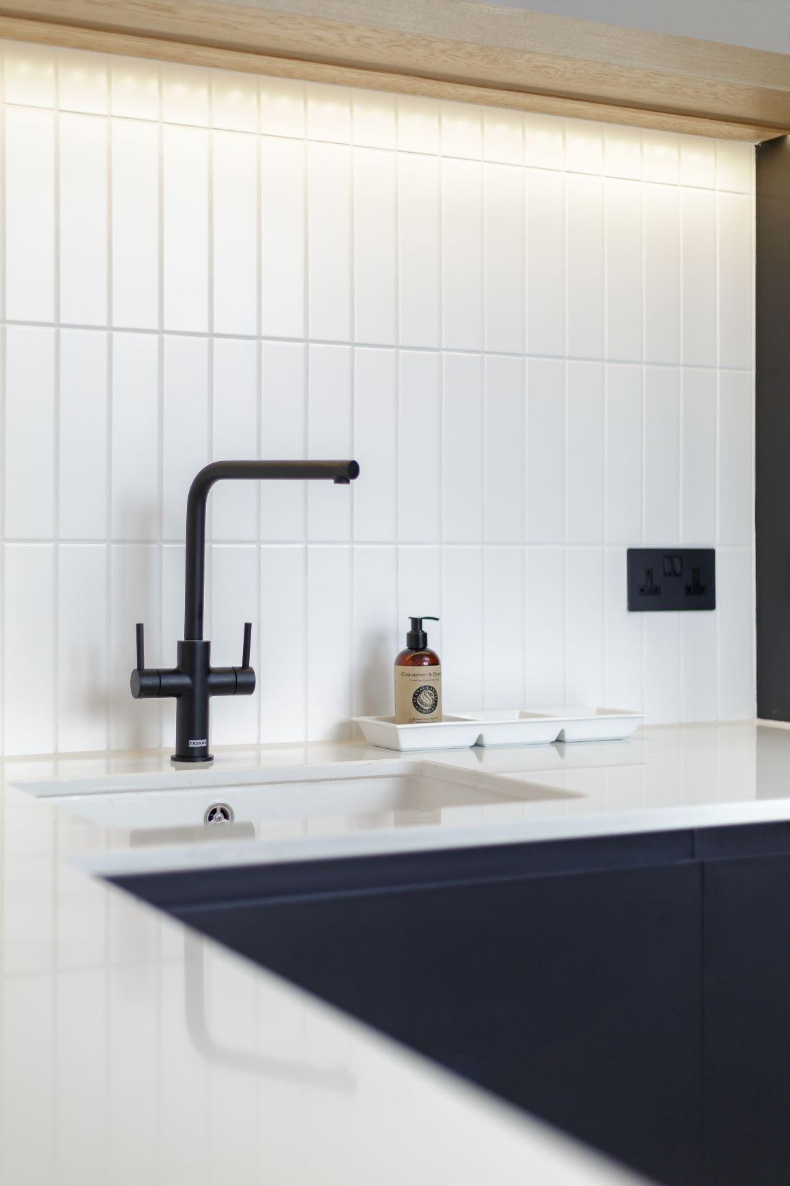 Close-up of the kitchen's open shelving, showcasing the storage capacity and decorative charm. Glassware and decorative accents add a touch of personality, while the ample space ensures organisation and accessibility.