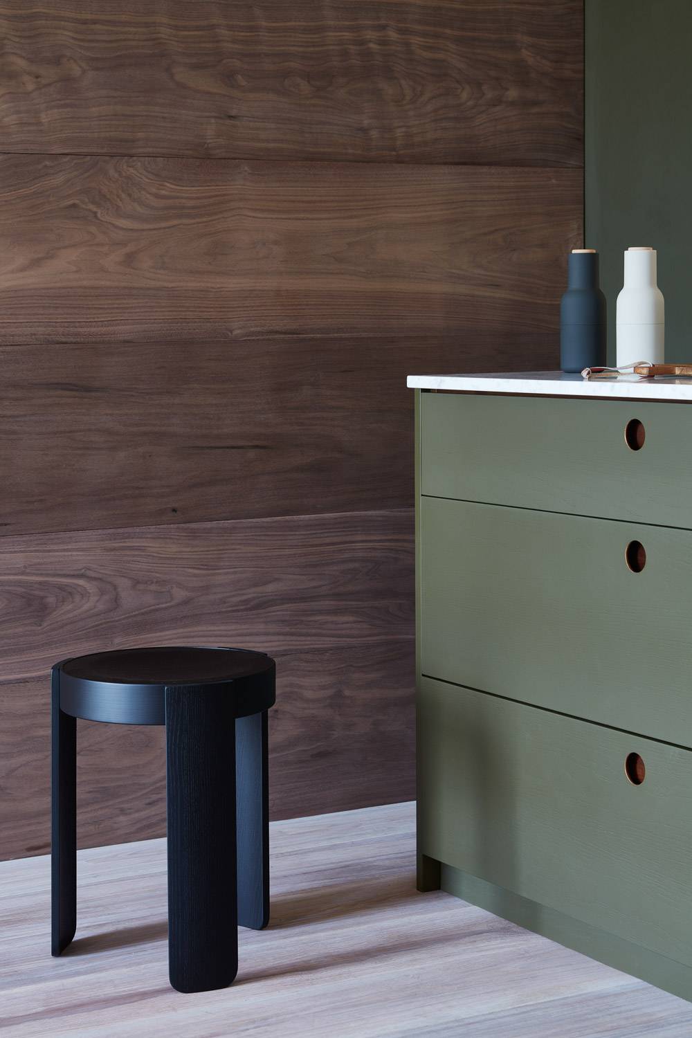 The Ladbroke kitchen seamlessly blends into a contemporary living space, showcasing its versatility and adaptability. The kitchen's modern aesthetic is complemented by the sleek countertops and appliances, creating a sophisticated and inviting ambiance