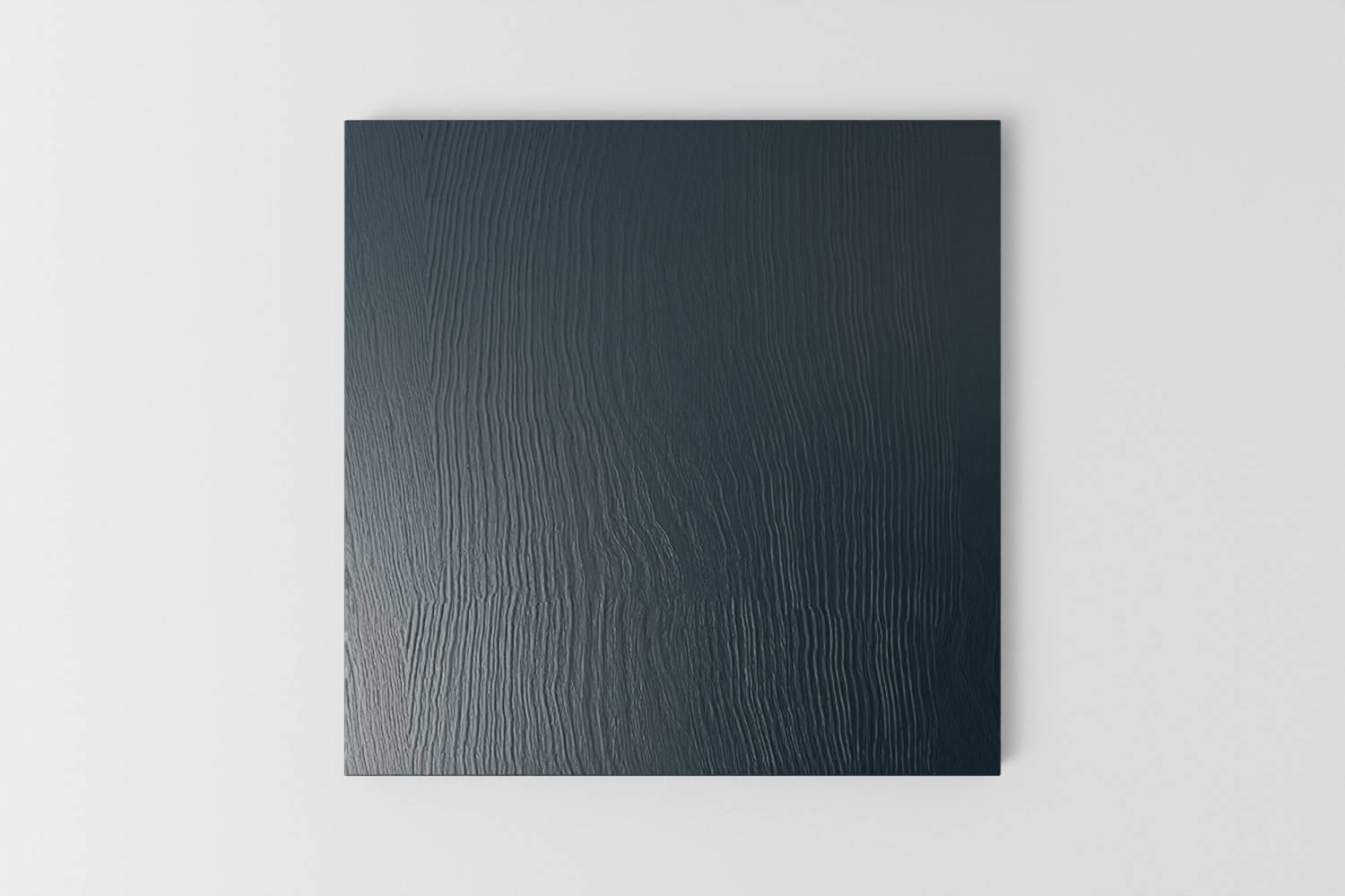 Picture of a square sample painted with a visible grain in Naked Kitchen's Night Harbour dark blue colour