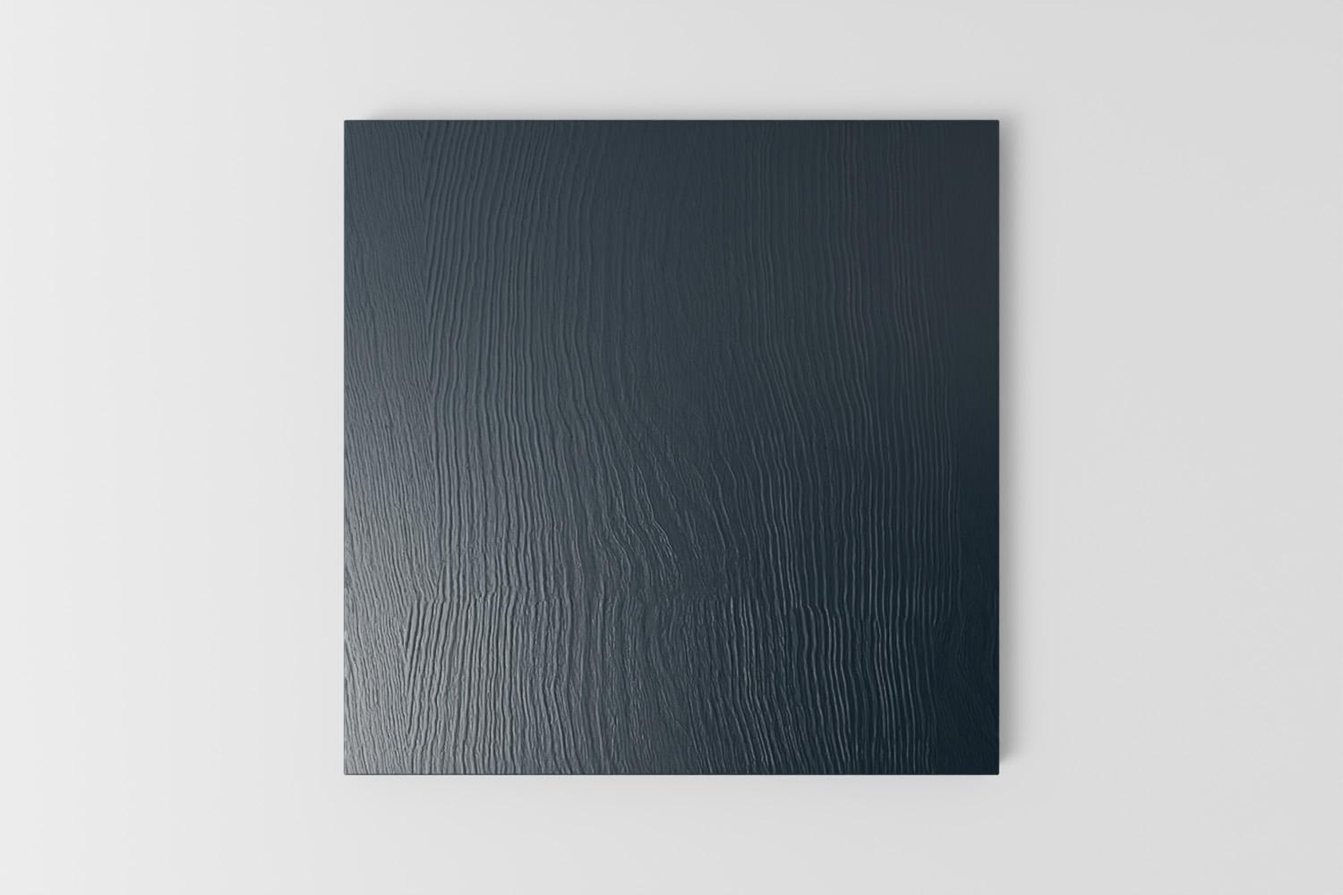 Picture of a square sample painted with a visible grain in Naked Kitchen's Night Harbour dark blue colour