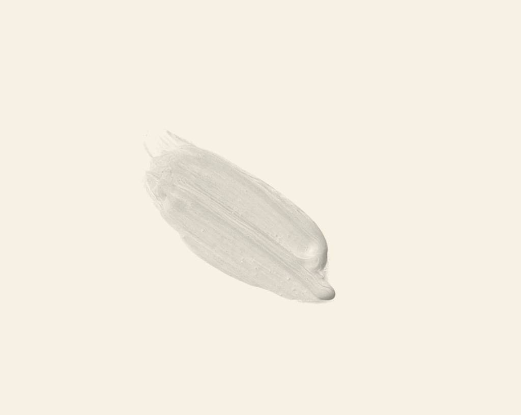 A single brushstroke of Sea Froth paint on a slightly lighter White background. The paint appears smooth and slightly textured, with soft edges.