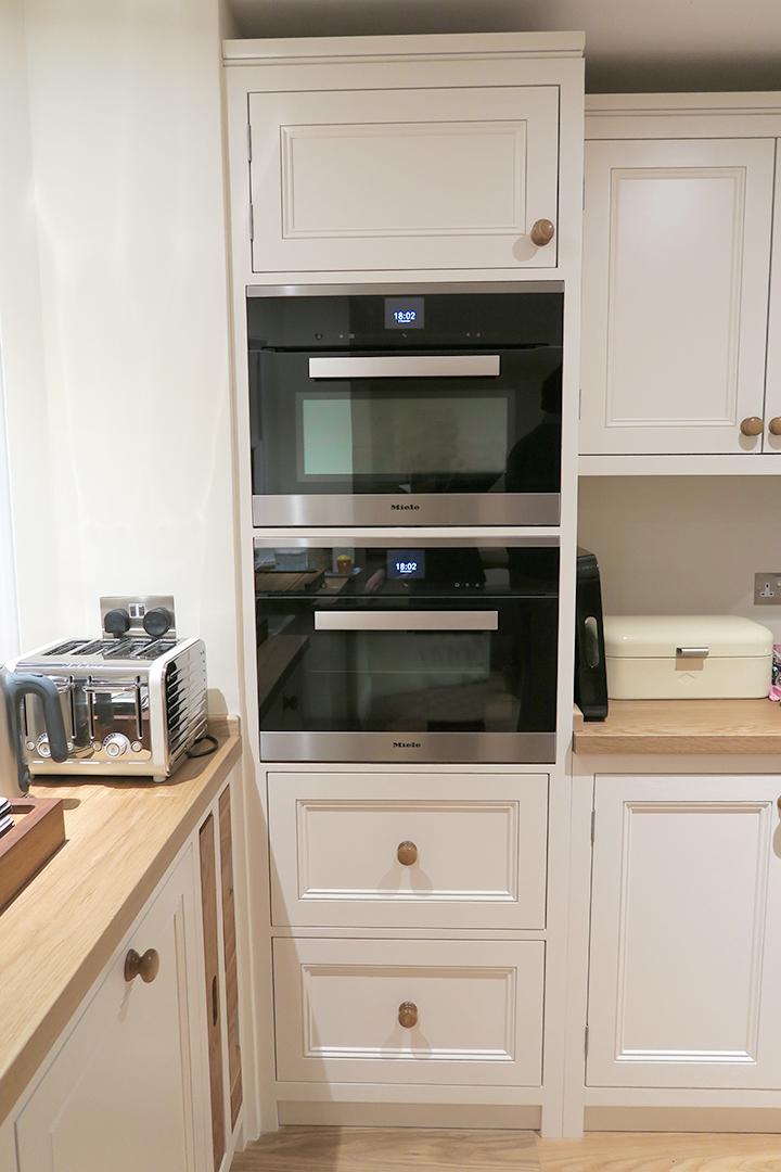 miele oven in bespoke white kitchen