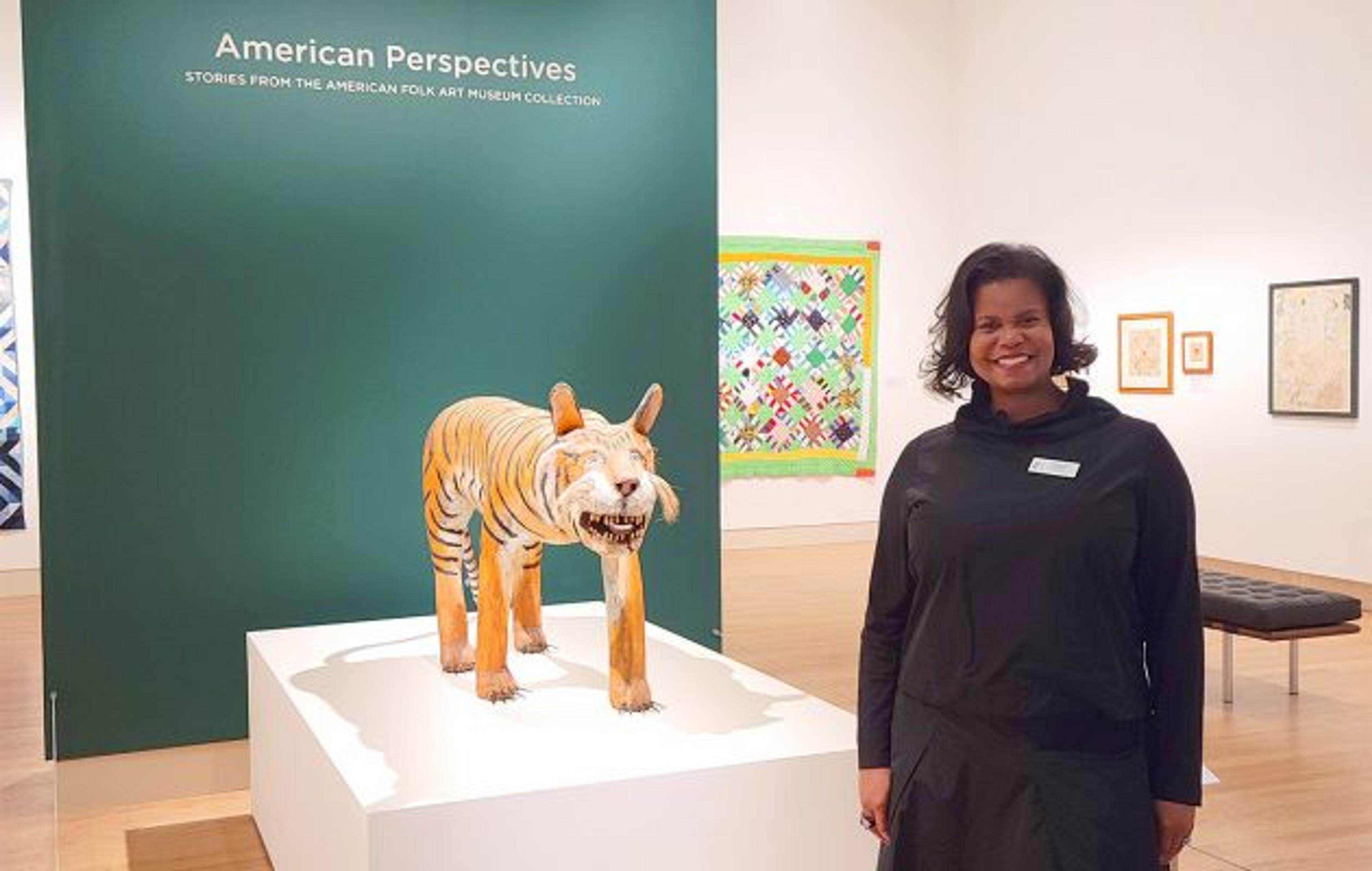 George W. and Kathleen I. Gibbs Director and Chief Executive Officer Dr. Andrea Barnwell Brownlee poses next to "Tiger" (1977) by New Mexico artist Felipe Benito Archuleta, part of the Cummer Museum's new exhibit "American Perspectives: Stories from the American Folk Art Museum Collection." Photo by Michele Leivas.