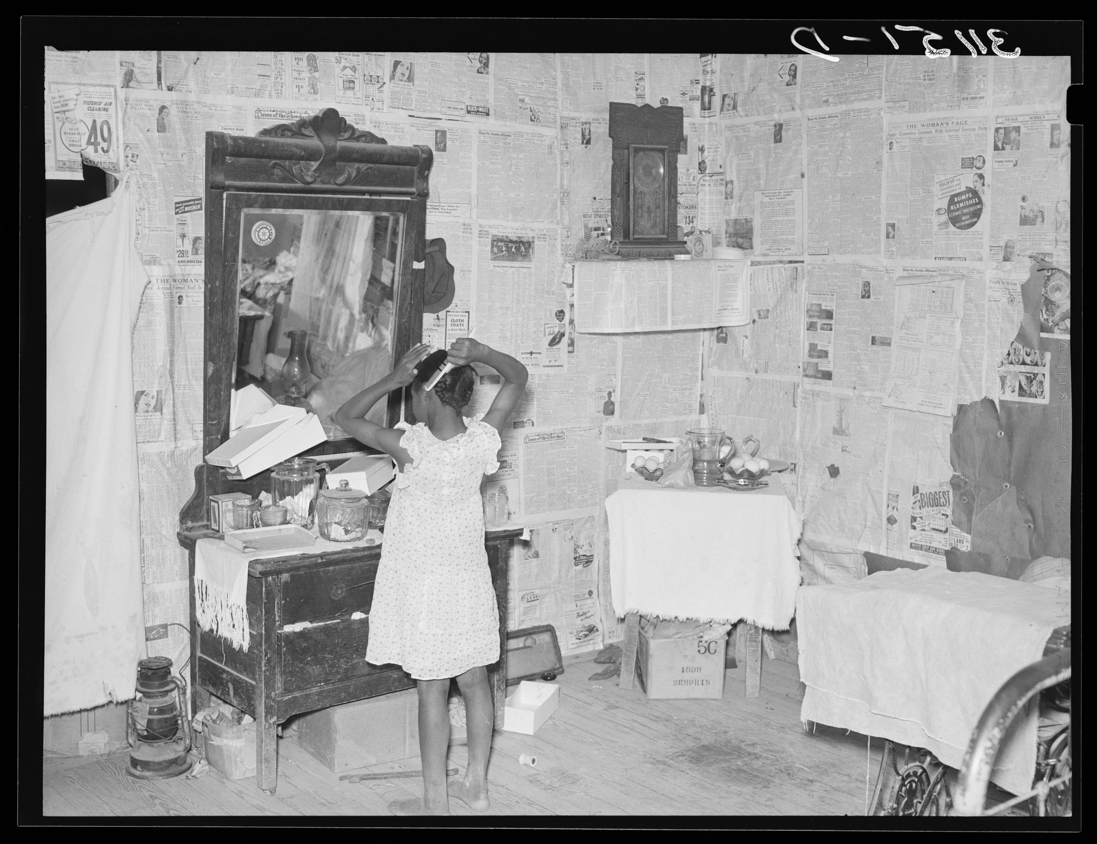 Russell Lee, "Southeast Missouri Farms. Sharecropper's child combing hair in bedroom of shack home near La Forge project, Missouri," Library of Congress, Prints & Photographs Division, Farm Security Administration/Office of War Information Black-and-White Negatives.