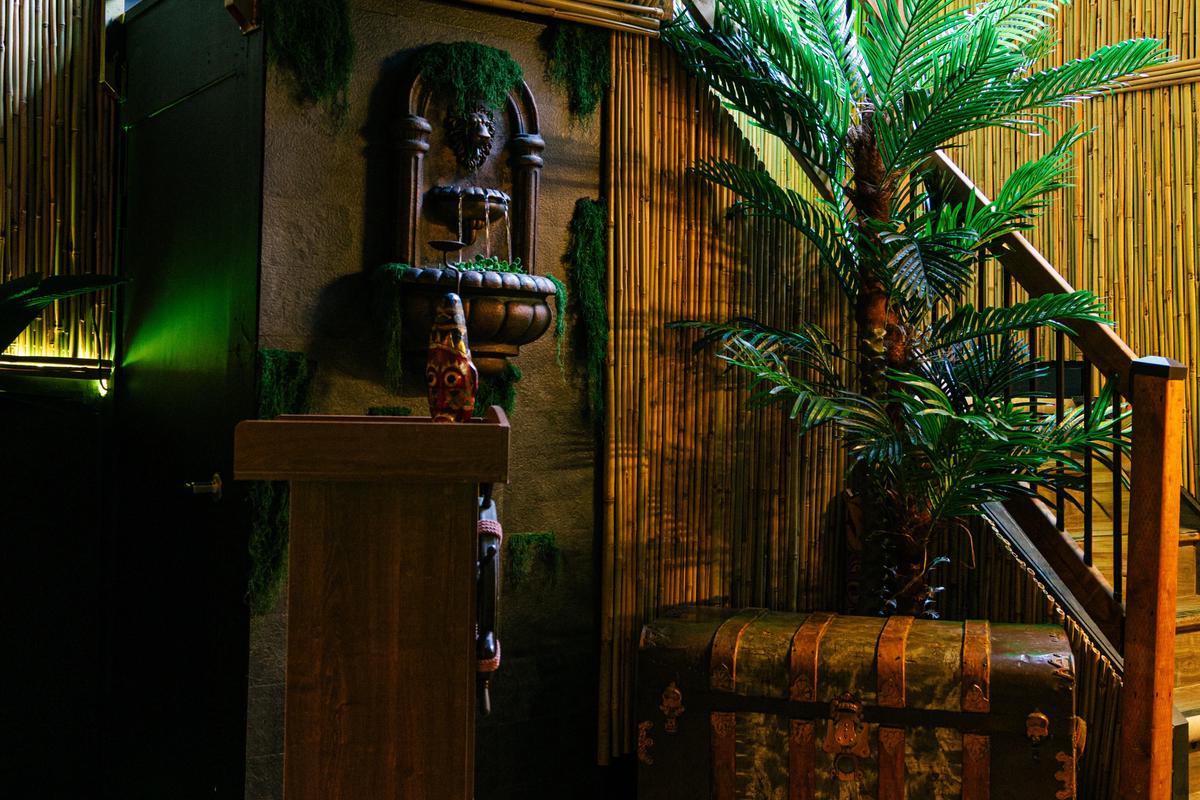 A tucked-away corner filled with layered tropical details