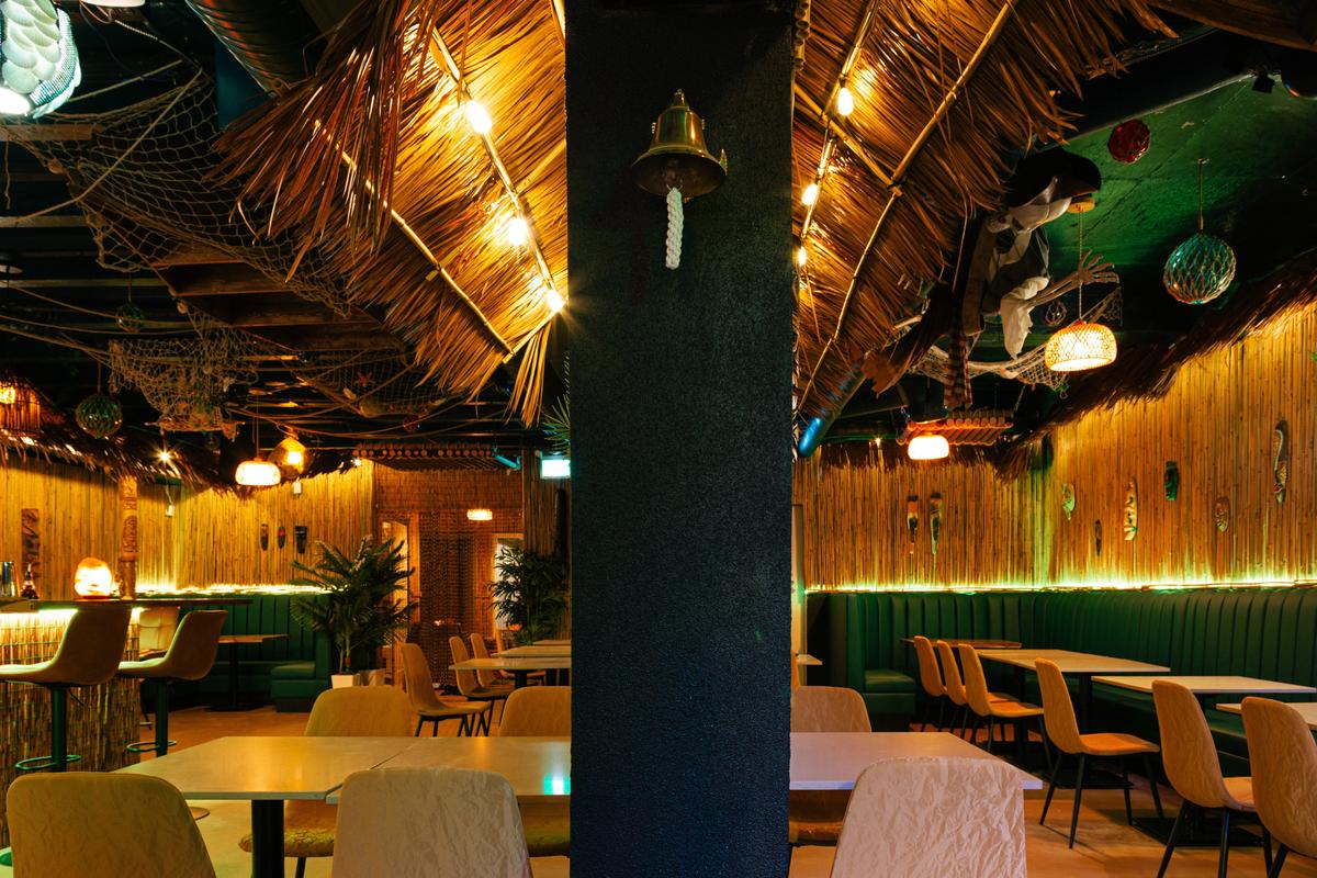 Immersive tiki-inspired interior at Jungle Bird
