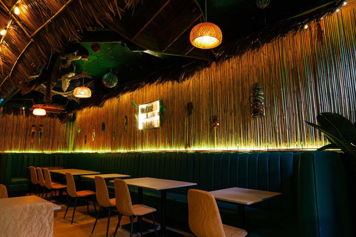 A cozy corner of Jungle Bird’s tiki lounge