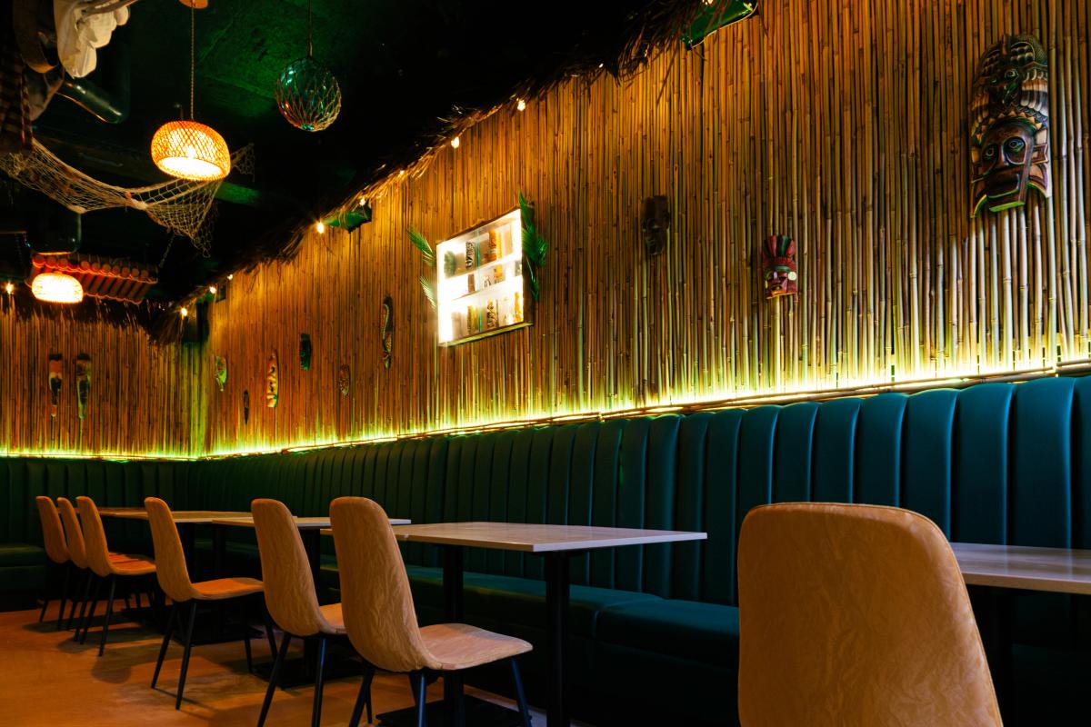 Classic tiki lounge atmosphere with handcrafted decor at Jungle Bird Calgary