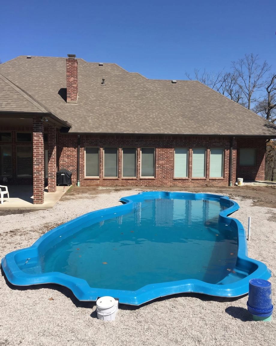 A fiberglass pool set in the finished dig