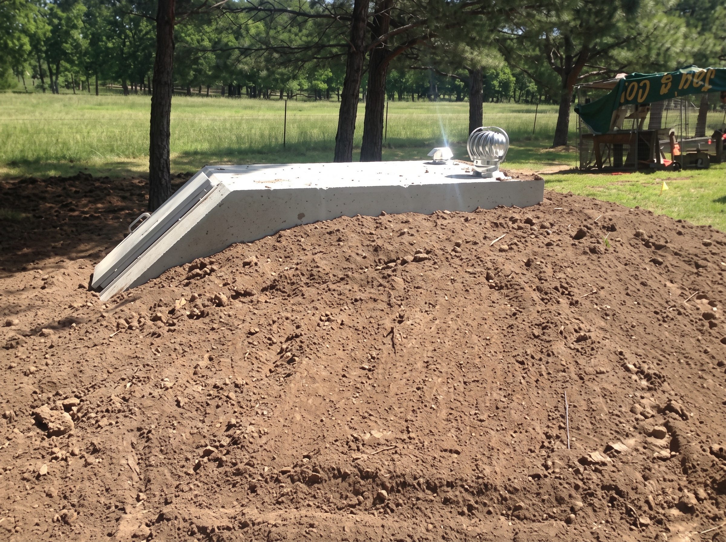 Shelter mound graded and seeded