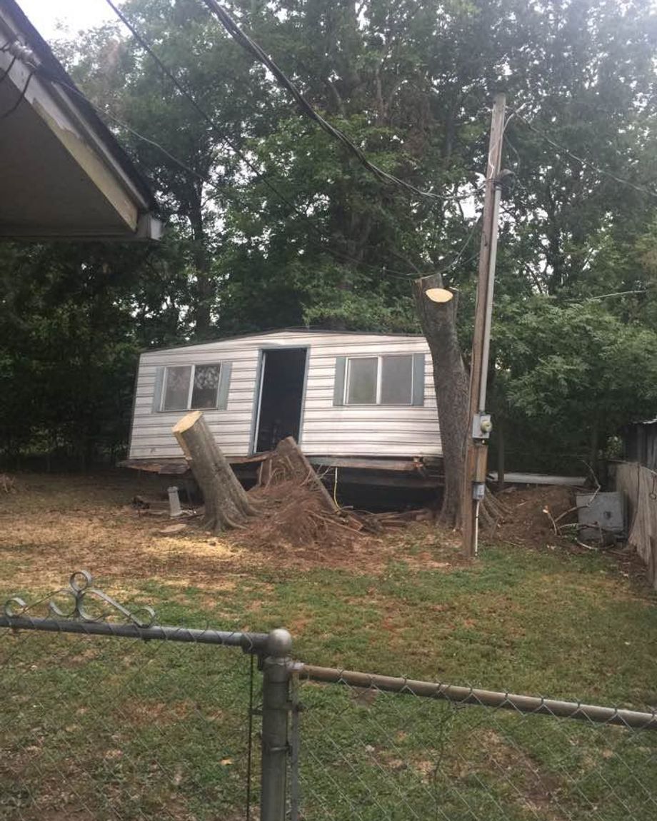 A mobile home being cleared off a lot