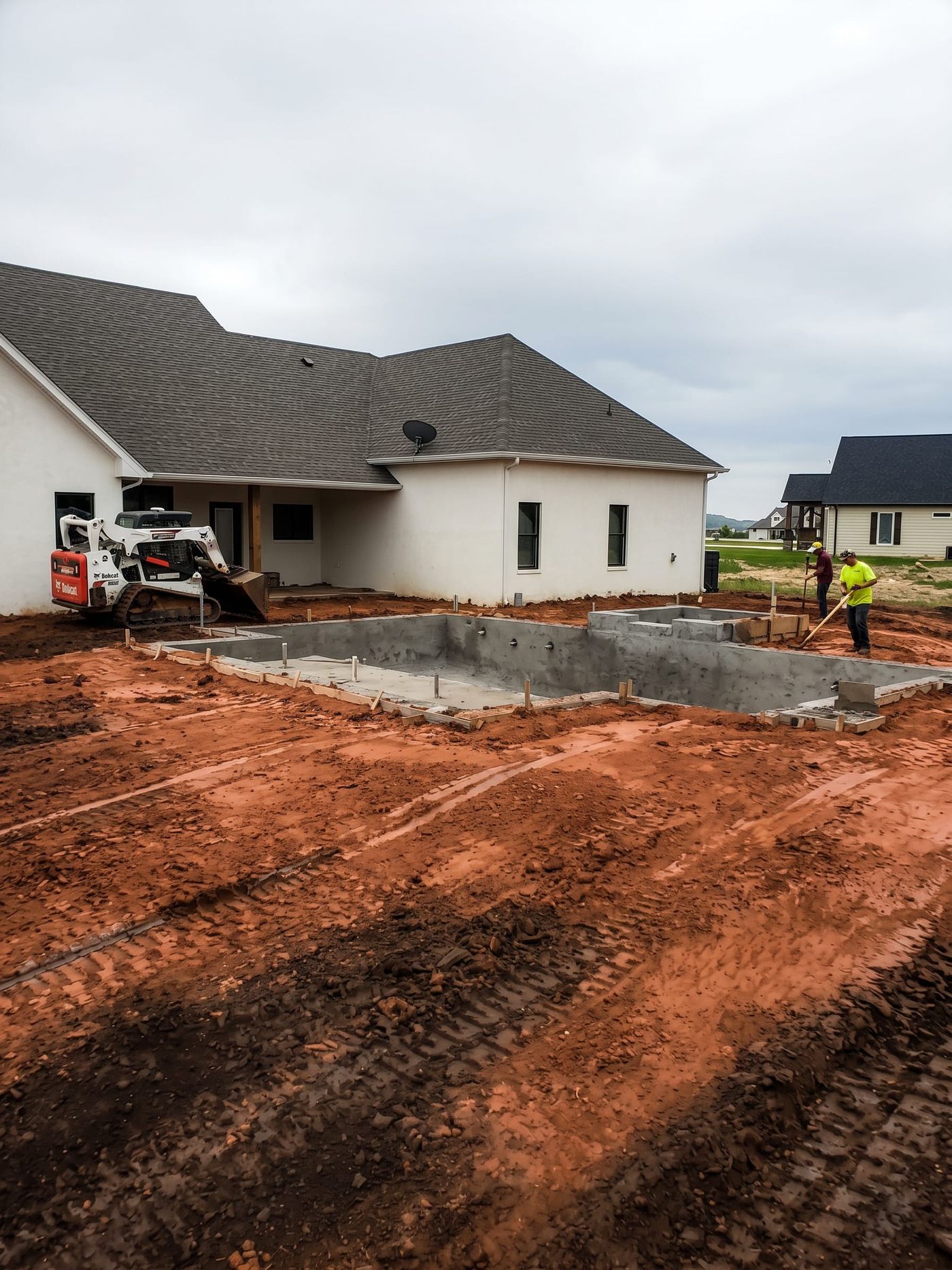 A house pad graded and formed for the foundation