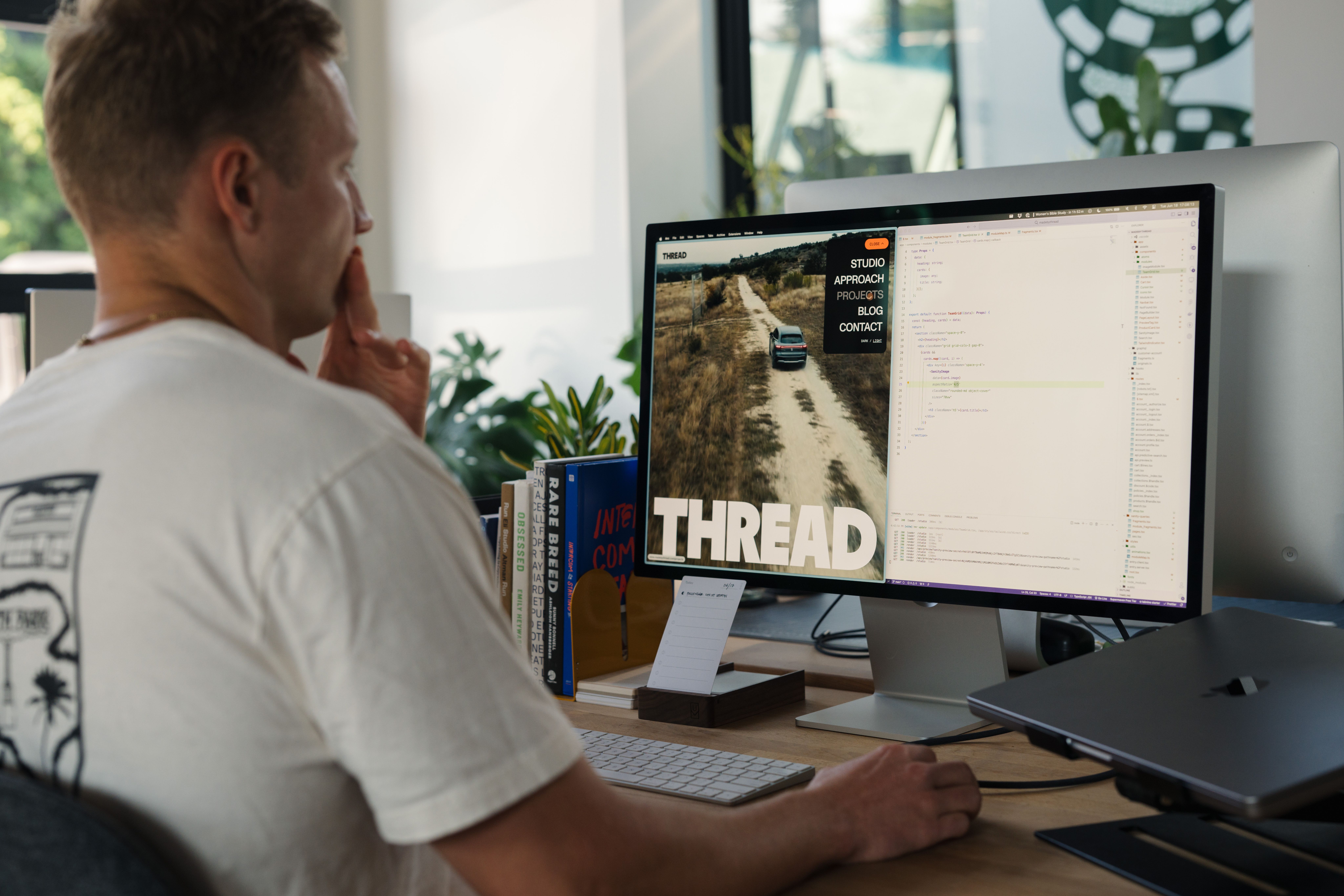 Developer working on code sitting at a desk