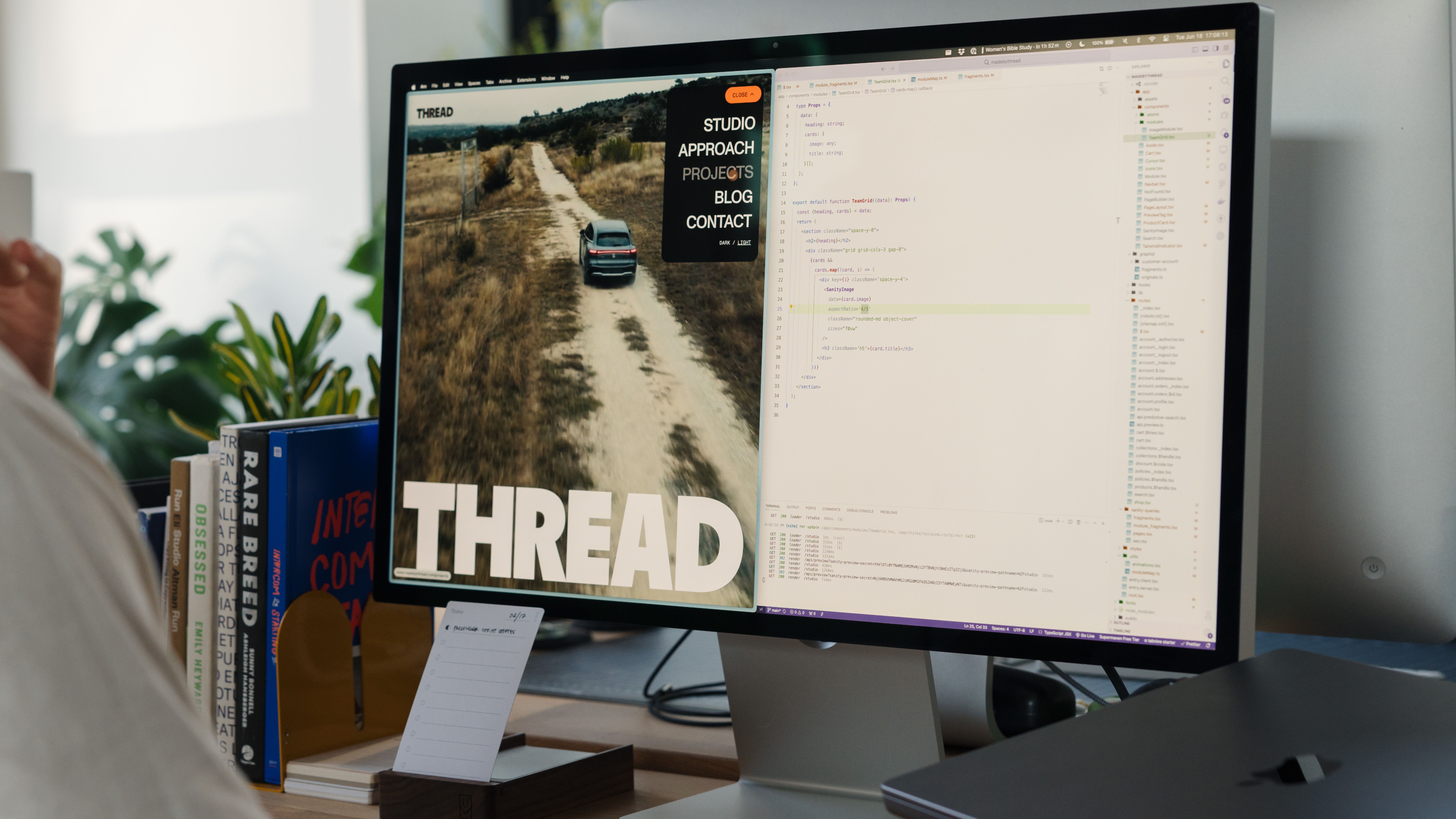 Developer working on code sitting at a desk