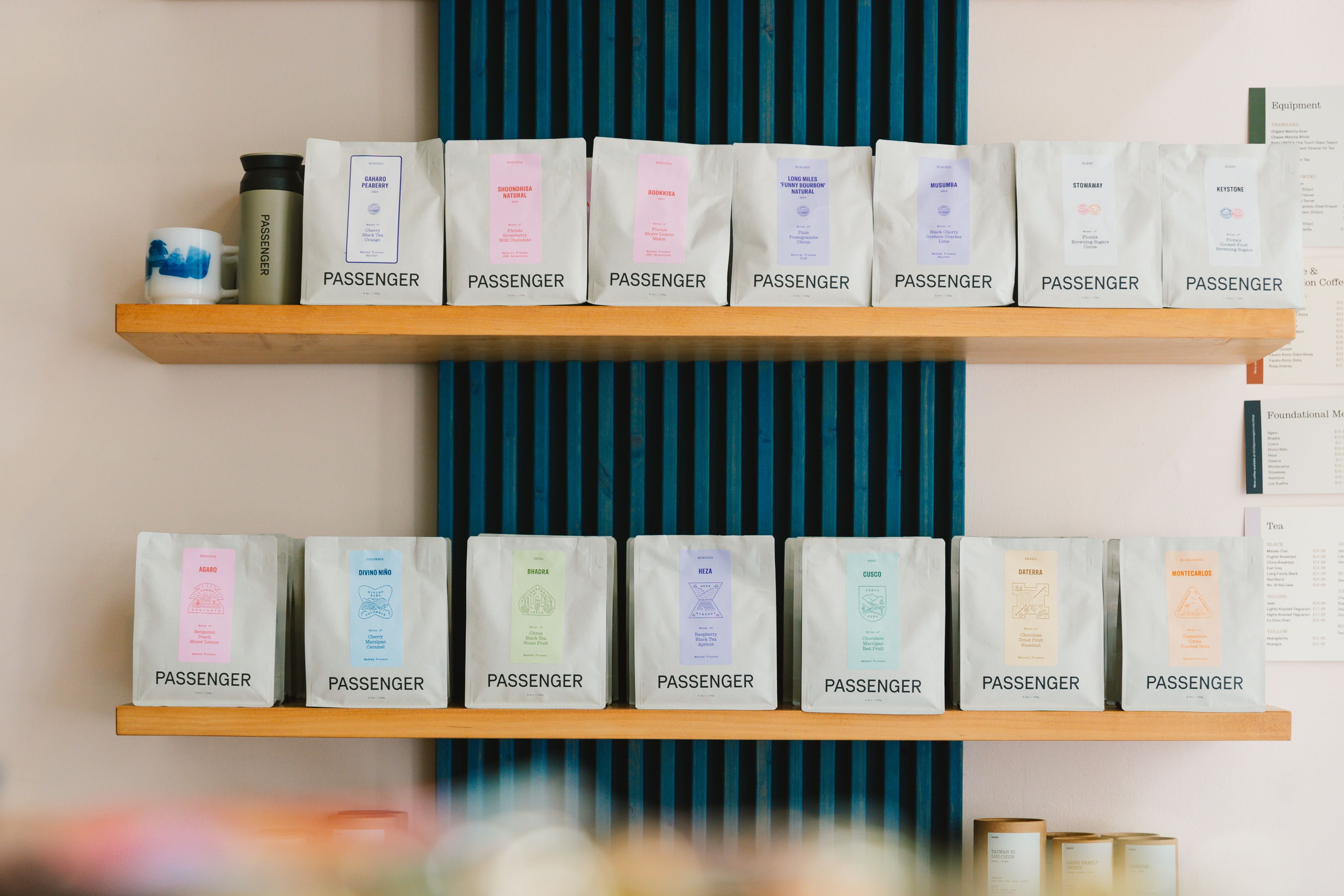 Colorful retail shelves displaying books, candles, and curated lifestyle products