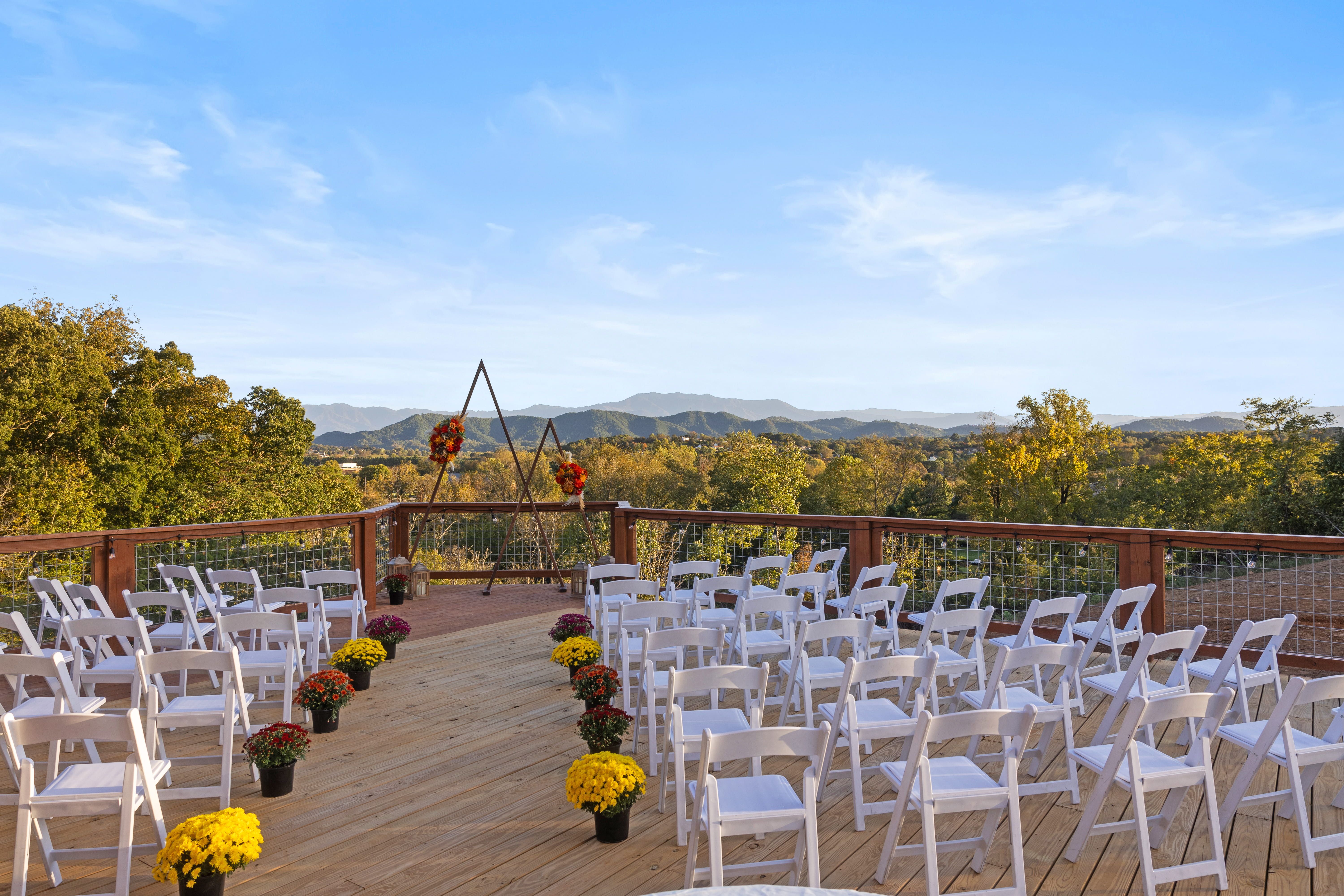 Outdoor ceremony space with panoramic views of Mount Leconte for up to 60 guests