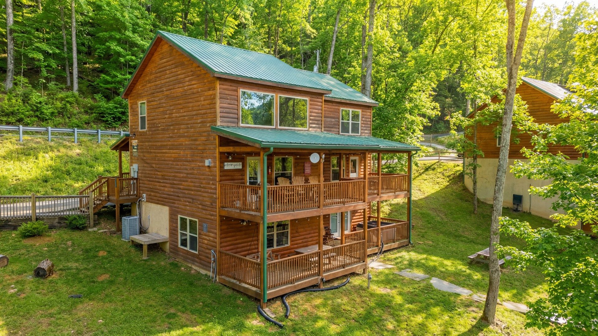 A 4-bedroom, 4-bath luxury cabin featuring an indoor pool, theater, game room, and hot tub.