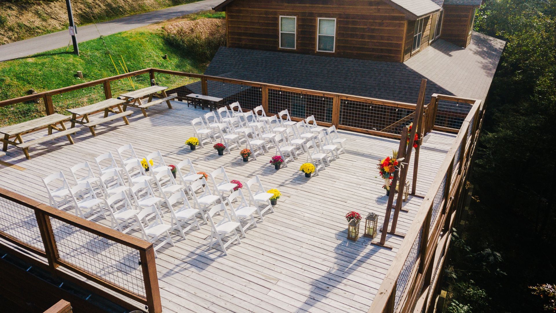 900 sq ft. outdoor deck can accommodate up to 60 guests for an outdoor ceremony or reception with hillside views of the Smokies.