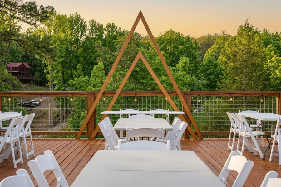 Spacious deck overlooking mountain views at Elegant Elite Estate