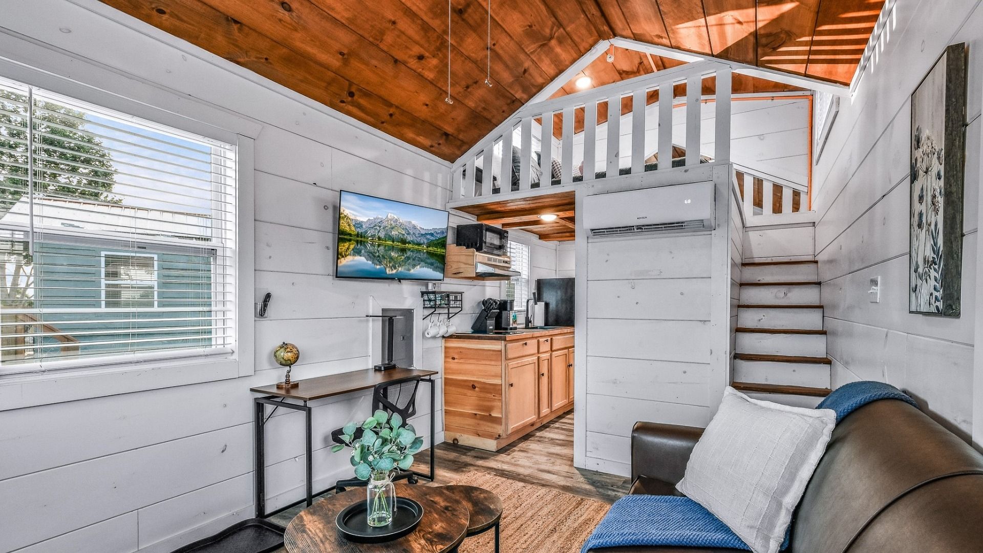 A combined kitchenette and living area designed for dining, relaxing, and everyday comfort.