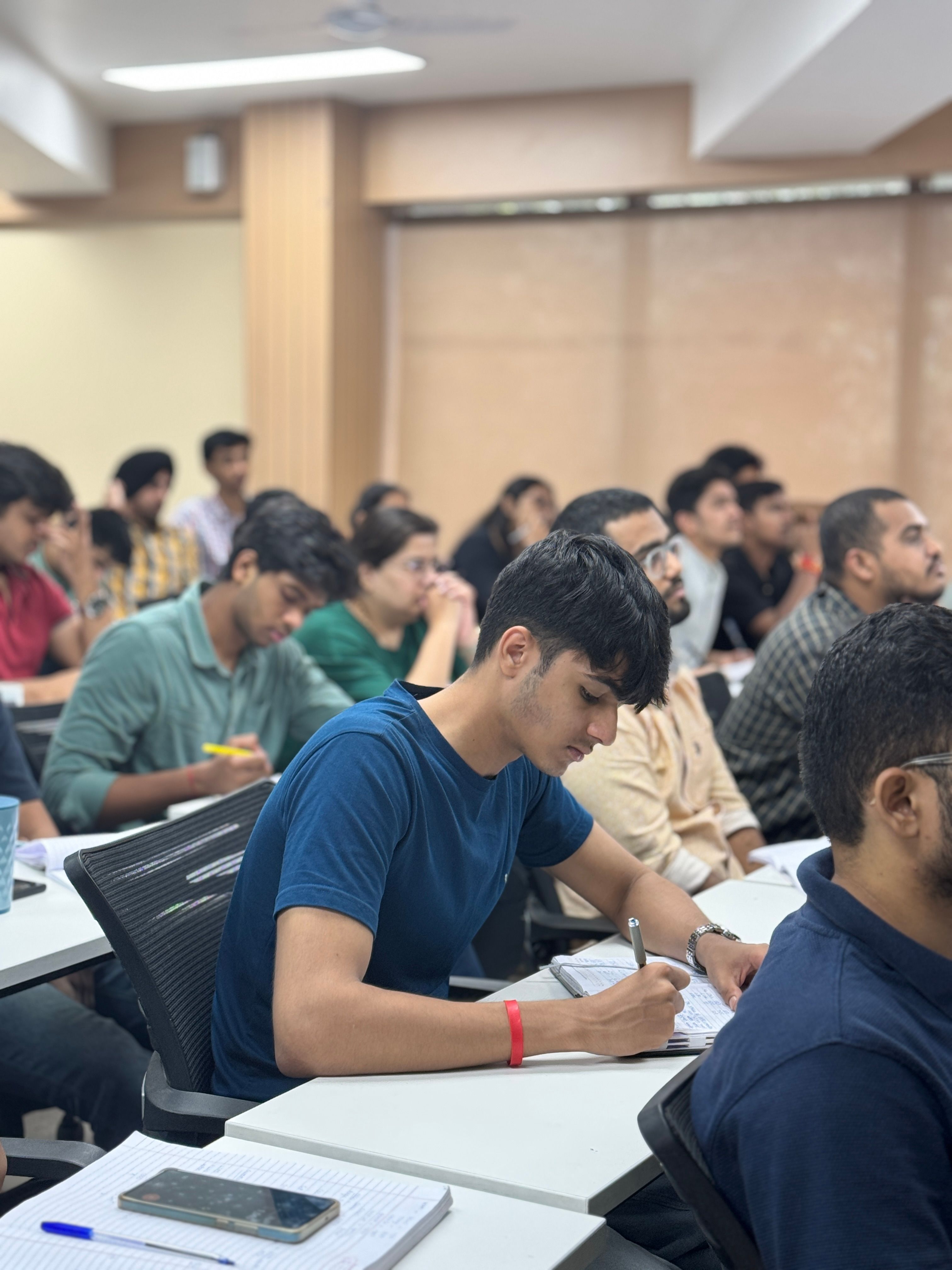 Student standing at a crossroads